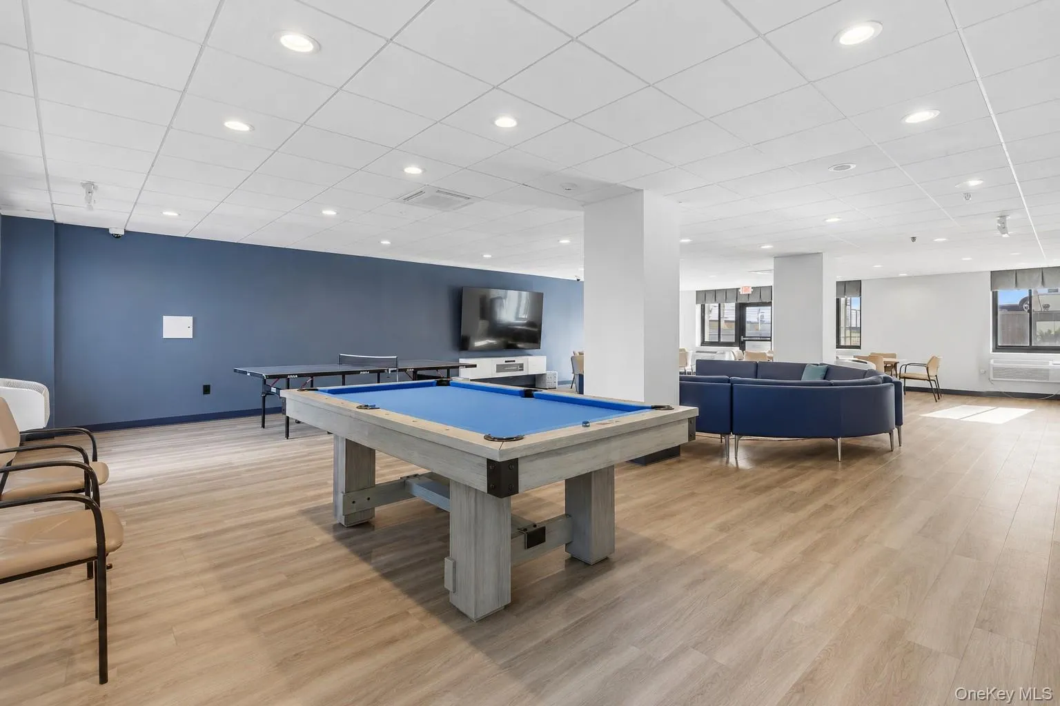 Party room with kitchen, large screen tv, pool table and ping pong Party room with kitchen, large screen tv, pool table and ping pong