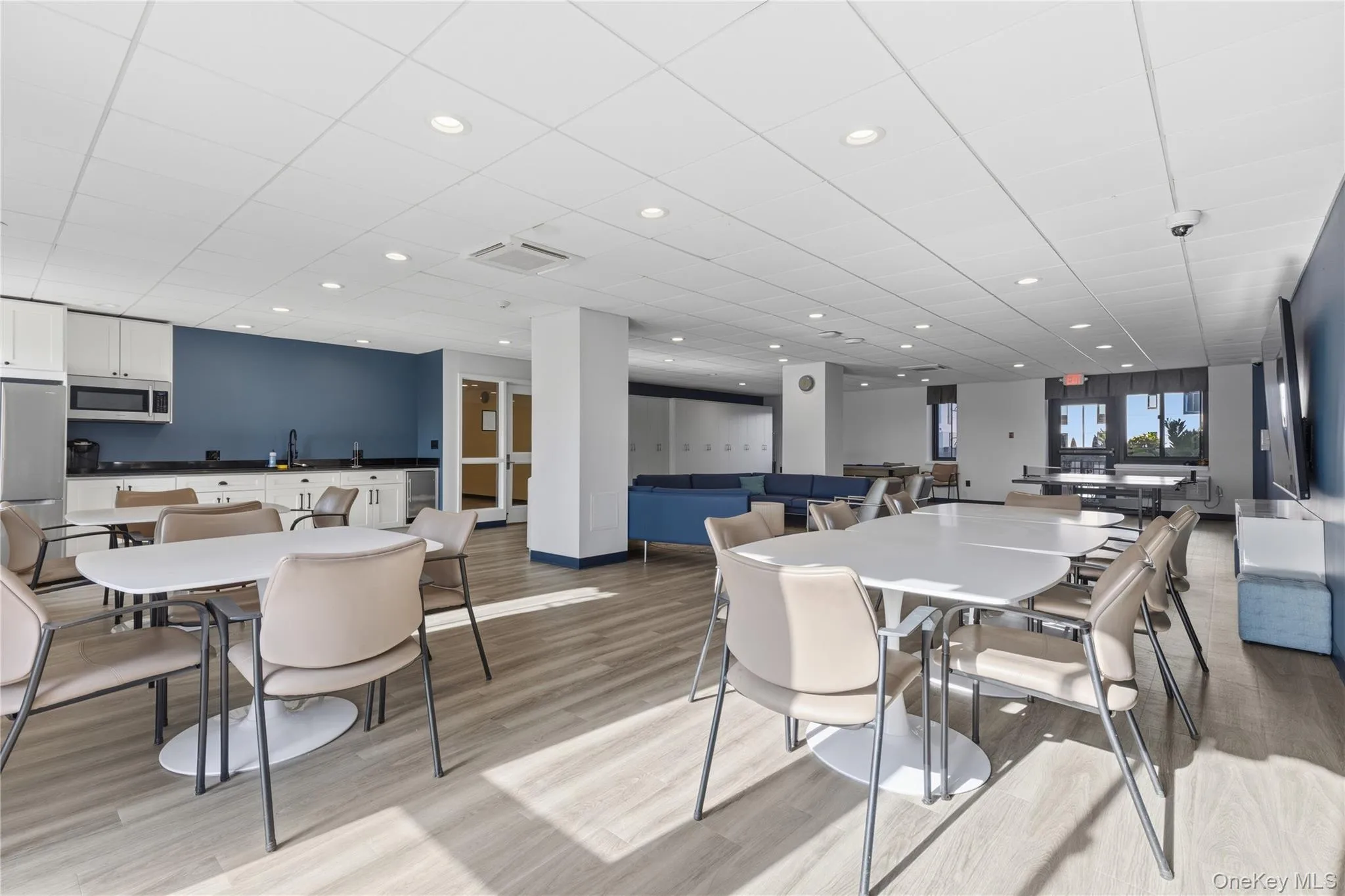 Party room with kitchen, large screen tv, pool table and ping pong Party room with kitchen, large screen tv, pool table and ping pong