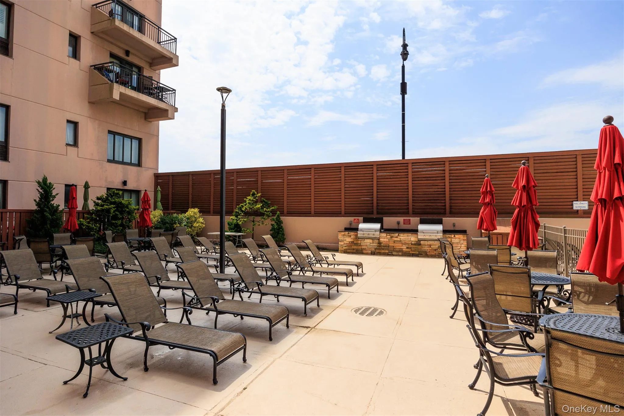 Pool deck with BBQs Pool deck with BBQs