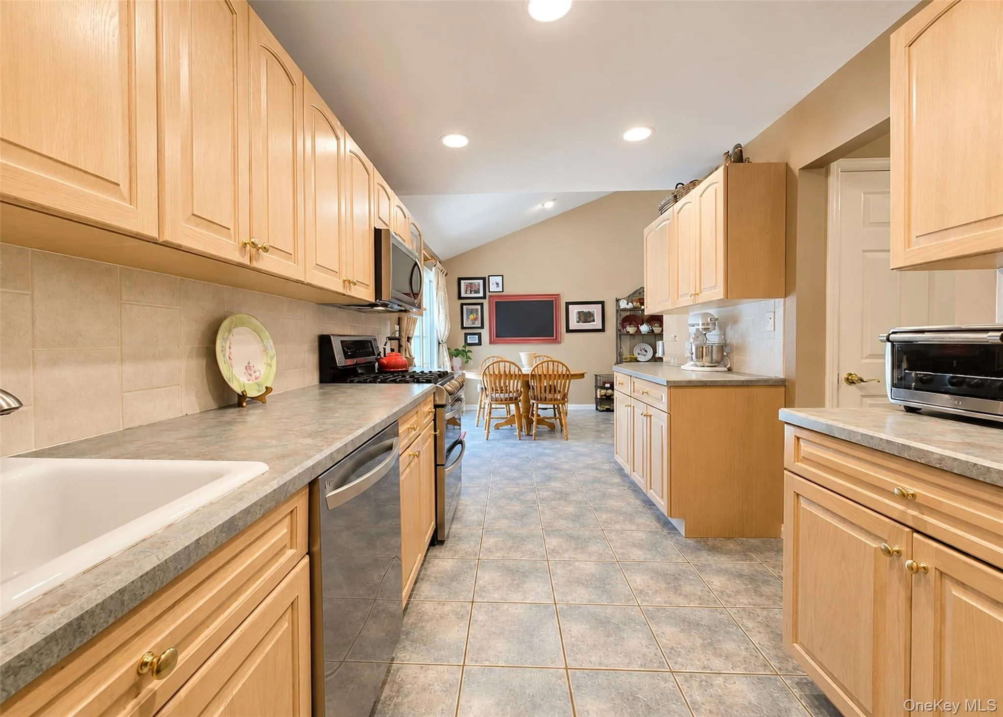 Stainless Steel appliances, recessed lighting, gas stove, EIK with cathedral ceiling Stainless Steel appliances, recessed lighting, gas stove, EIK with cathedral ceiling