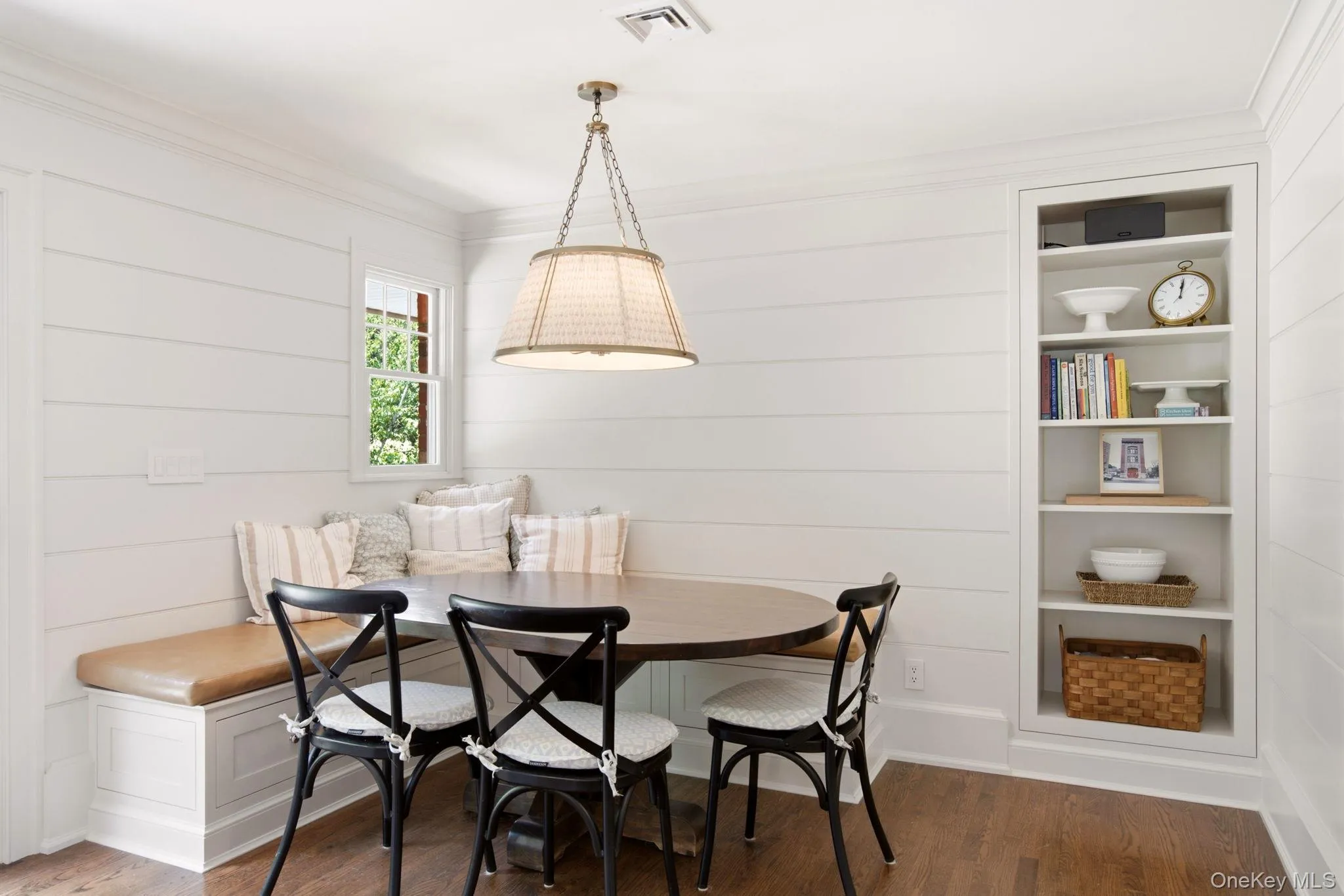 Beautiful shiplap feature wall with built in shelving. Beautiful shiplap feature wall with built in shelving.