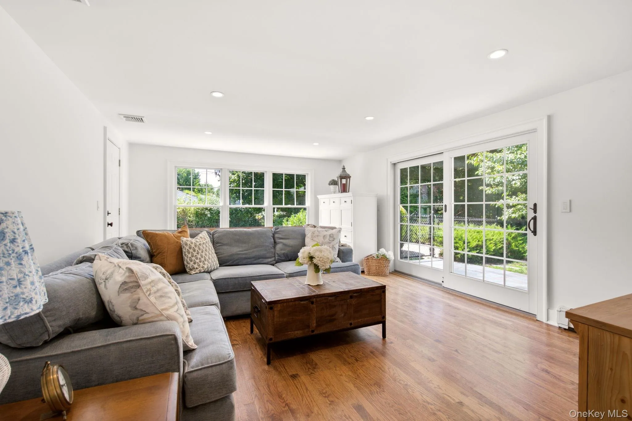 Sliding Doors open to a blue stone patio overlooking the yard. Sliding Doors open to a blue stone patio overlooking the yard.