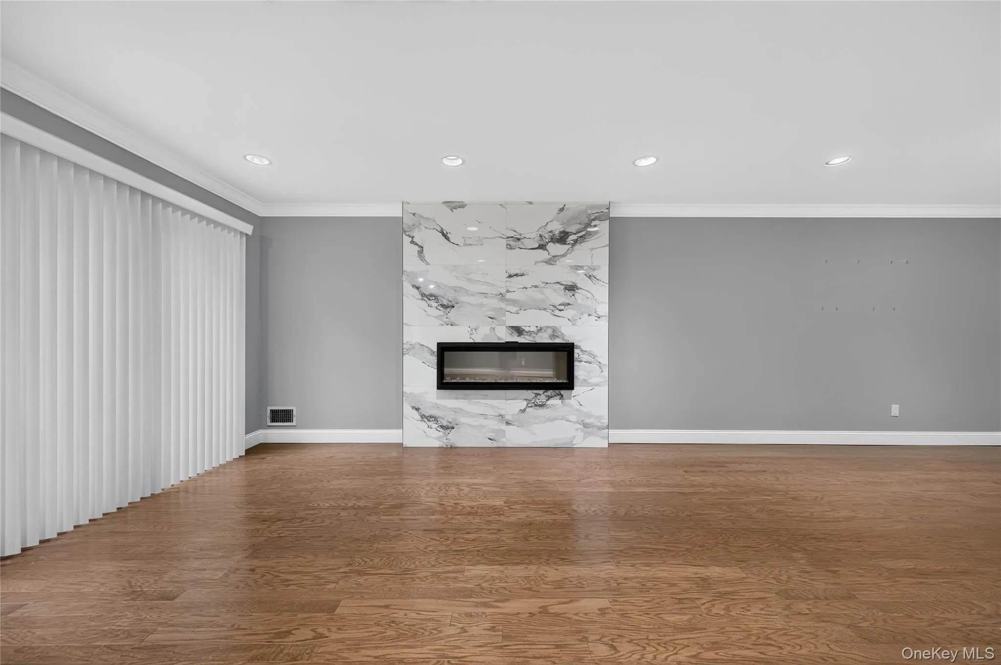 Front Living Room w/electric fireplace Front Living Room w/electric fireplace