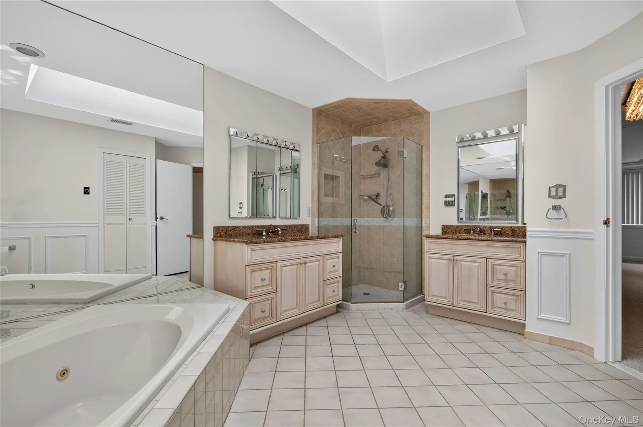 Primary Bathroom with Two Double Sinks & Jacuzzi Tub Primary Bathroom with Two Double Sinks & Jacuzzi Tub