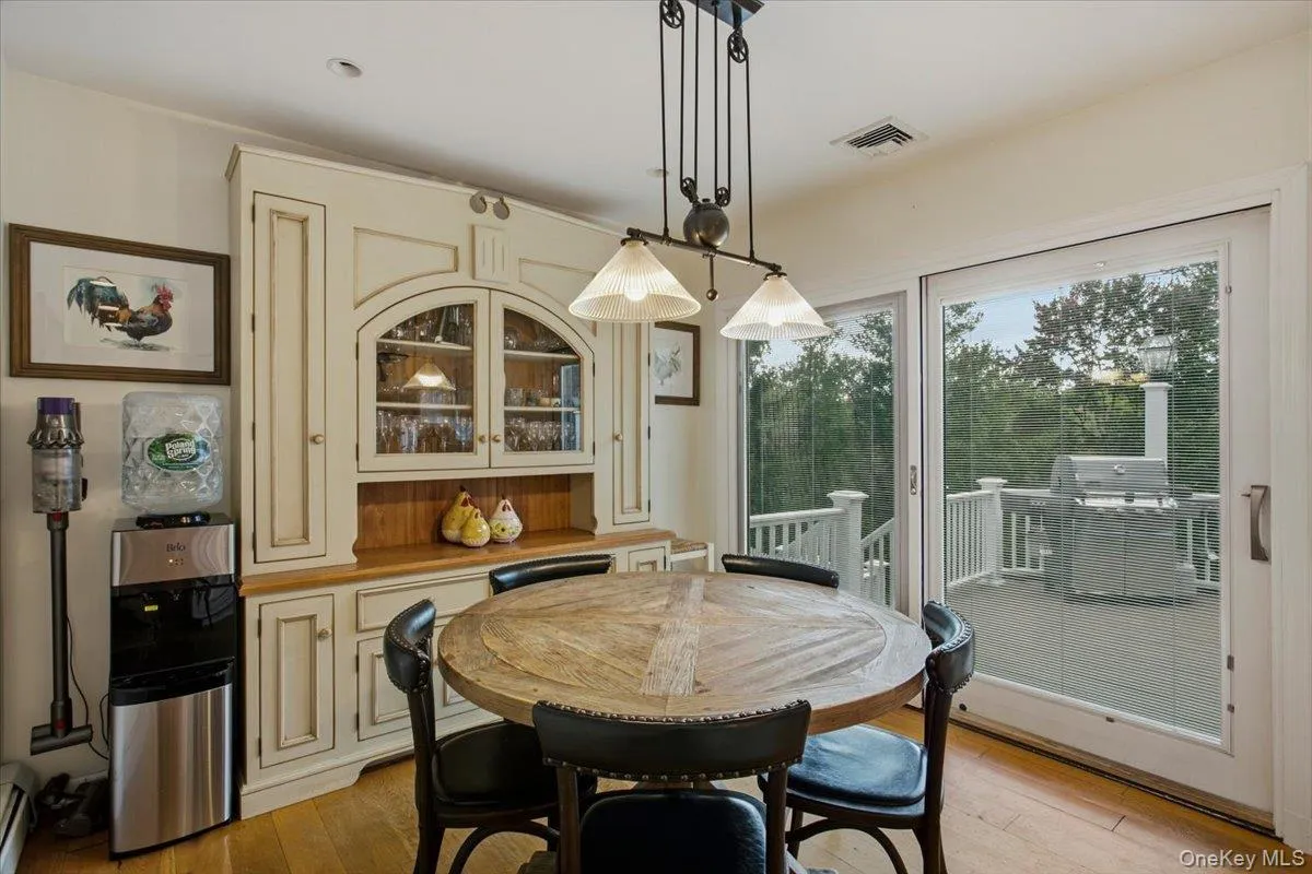 Kitchen table with doors to deck Kitchen table with doors to deck