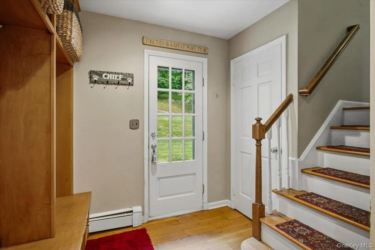 Mudroom with stairs up to second floor Mudroom with stairs up to second floor