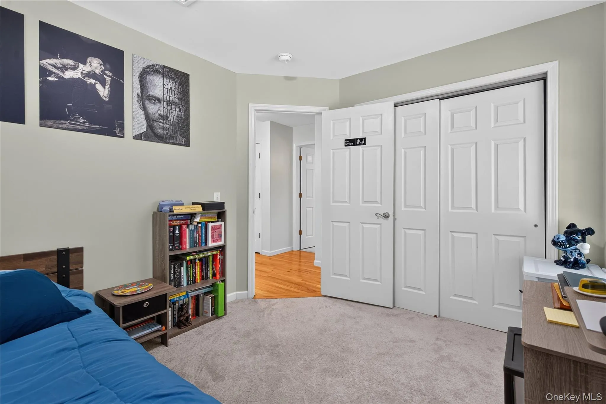 Carpeted flooring, light neutral wall paint, white trim, and a white six-panel closet door Carpeted flooring, light neutral wall paint, white trim, and a white six-panel closet door