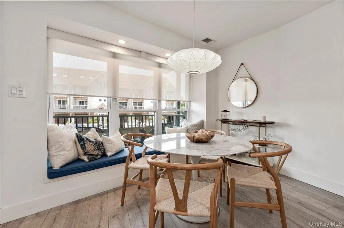 Bright open dining area with ocean views and window seat Bright open dining area with ocean views and window seat