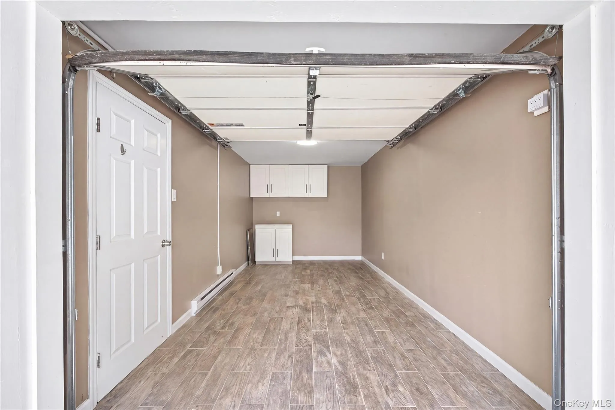 Full one car garage - Rear of dwelling access Full one car garage - Rear of dwelling access