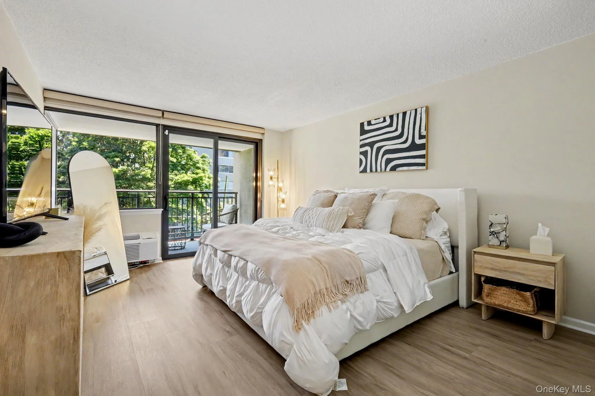A spacious and beautifully bright bedroom is filled with abundant natural light, creating an airy, peaceful retreat. A spacious and beautifully bright bedroom is filled with abundant natural light, creating an airy, peaceful retreat.
