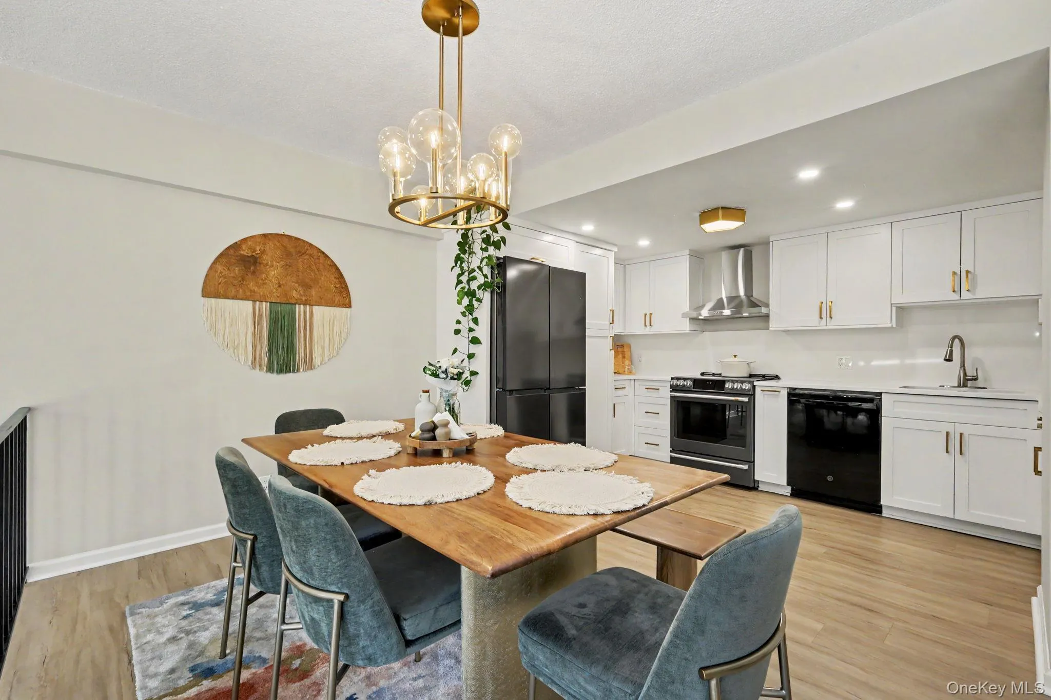 The generously proportioned dining area offers ample space for everything from everyday meals to memorable family celebrations, while remaining beautifully connected to the kitchen and overlooking the dramatic step-down living room. The generously proportioned dining area offers ample space for everything from everyday meals to memorable family celebrations, while remaining beautifully connected to the kitchen and overlooking the dramatic step-down living room.