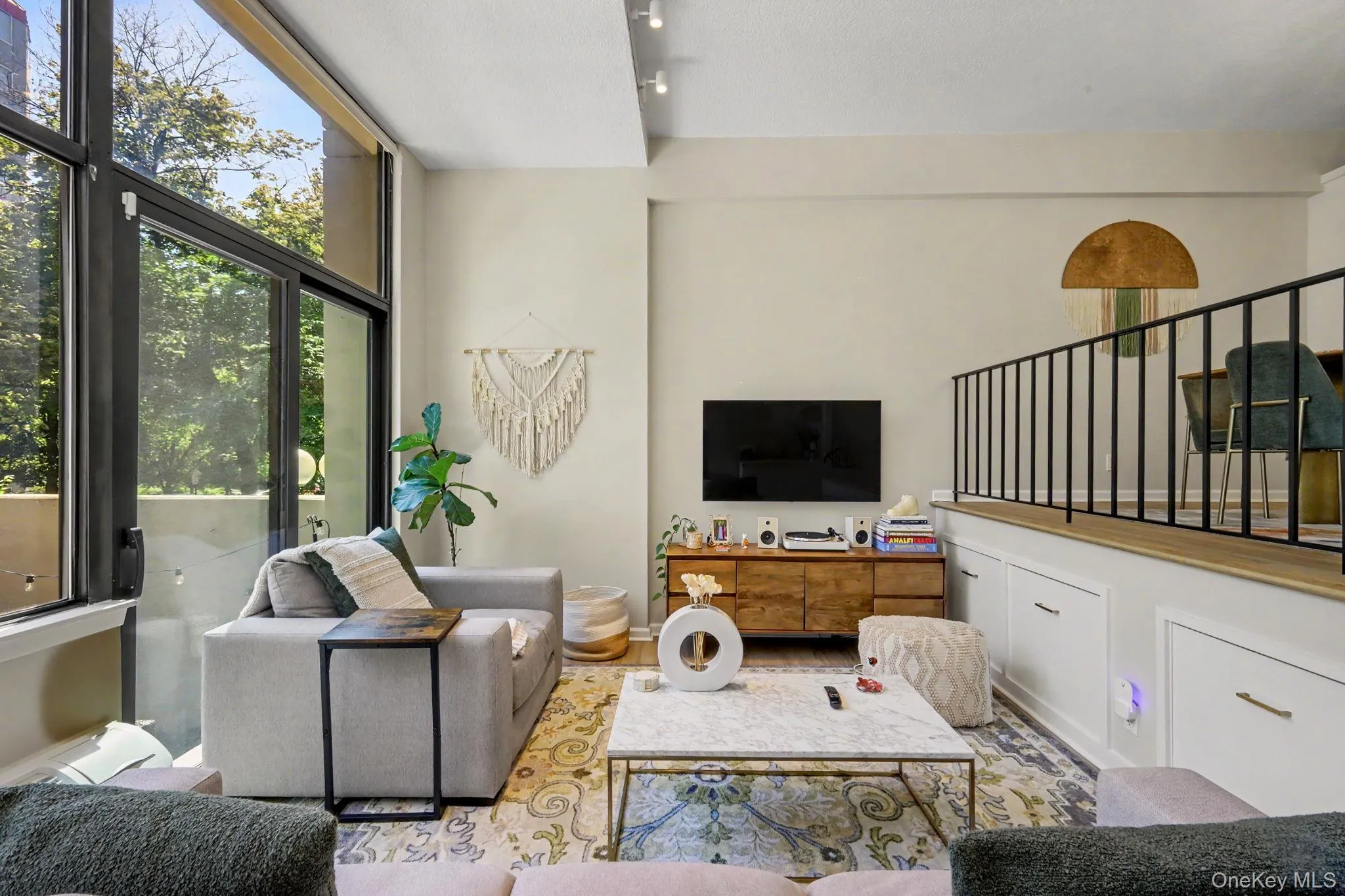 The impressive living room offers a wonderful sense of openness while maintaining just the right amount of separation from the kitchen and dining areas. The impressive living room offers a wonderful sense of openness while maintaining just the right amount of separation from the kitchen and dining areas.