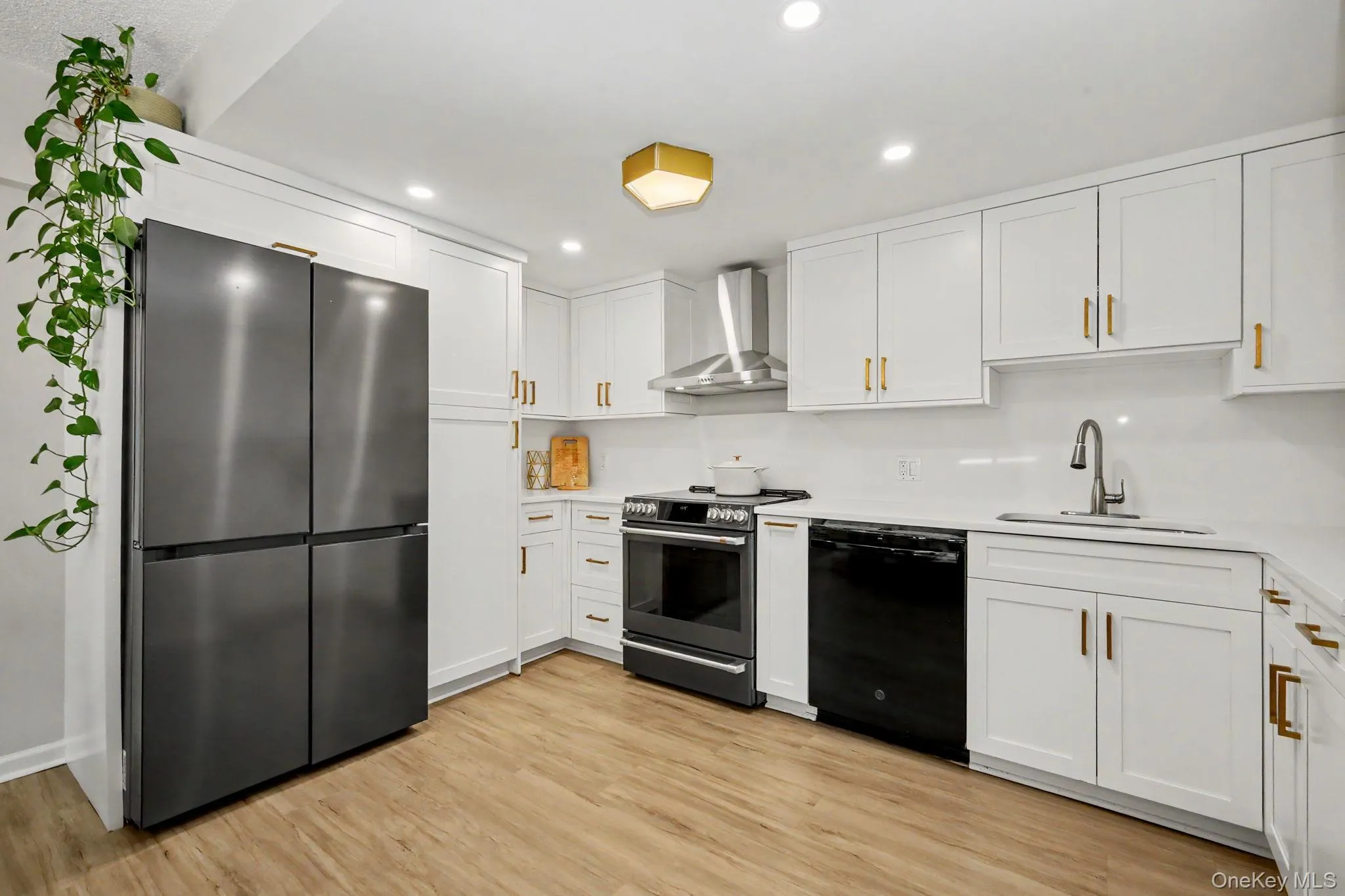 The spacious, beautifully renovated kitchen is both stylish and functional, featuring top-of-the-line appliances, gorgeous flooring, and generous countertop space ideal for cooking, entertaining, and everyday living. The spacious, beautifully renovated kitchen is both stylish and functional, featuring top-of-the-line appliances, gorgeous flooring, and generous countertop space ideal for cooking, entertaining, and everyday living.