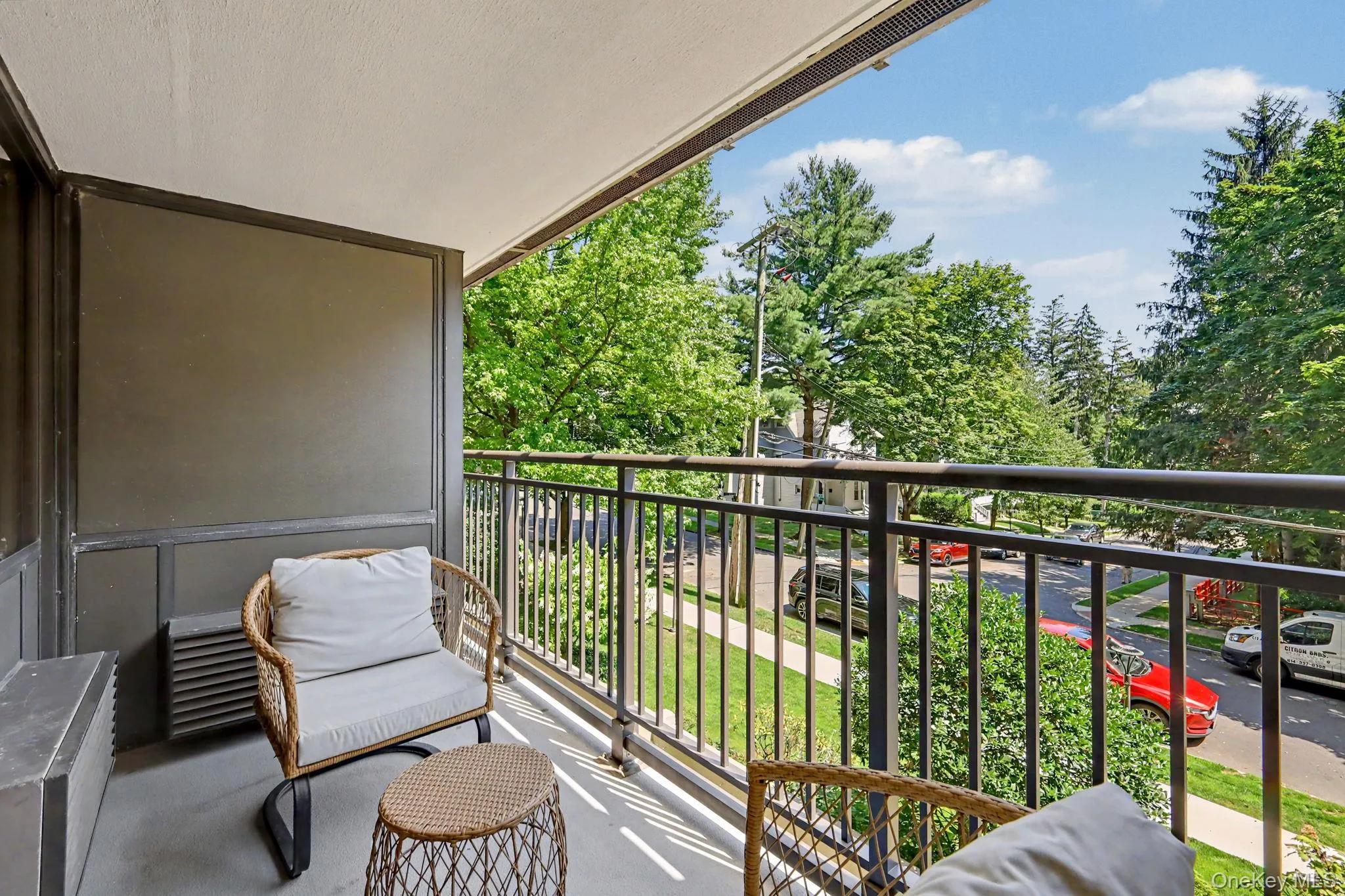 A dream for those who appreciate private outdoor living, the generously sized covered balcony offers a peaceful retreat overlooking front of the building A dream for those who appreciate private outdoor living, the generously sized covered balcony offers a peaceful retreat overlooking front of the building