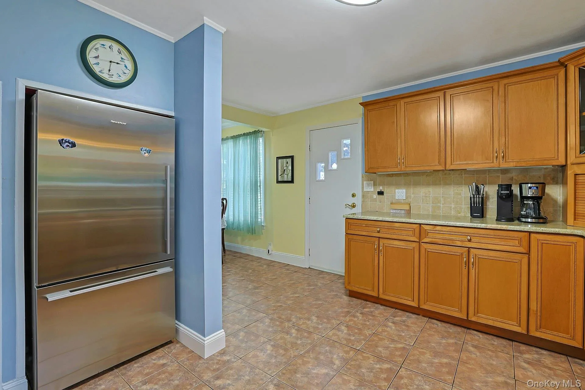 Kitchen with side door for easy access to driveway. Kitchen with side door for easy access to driveway.