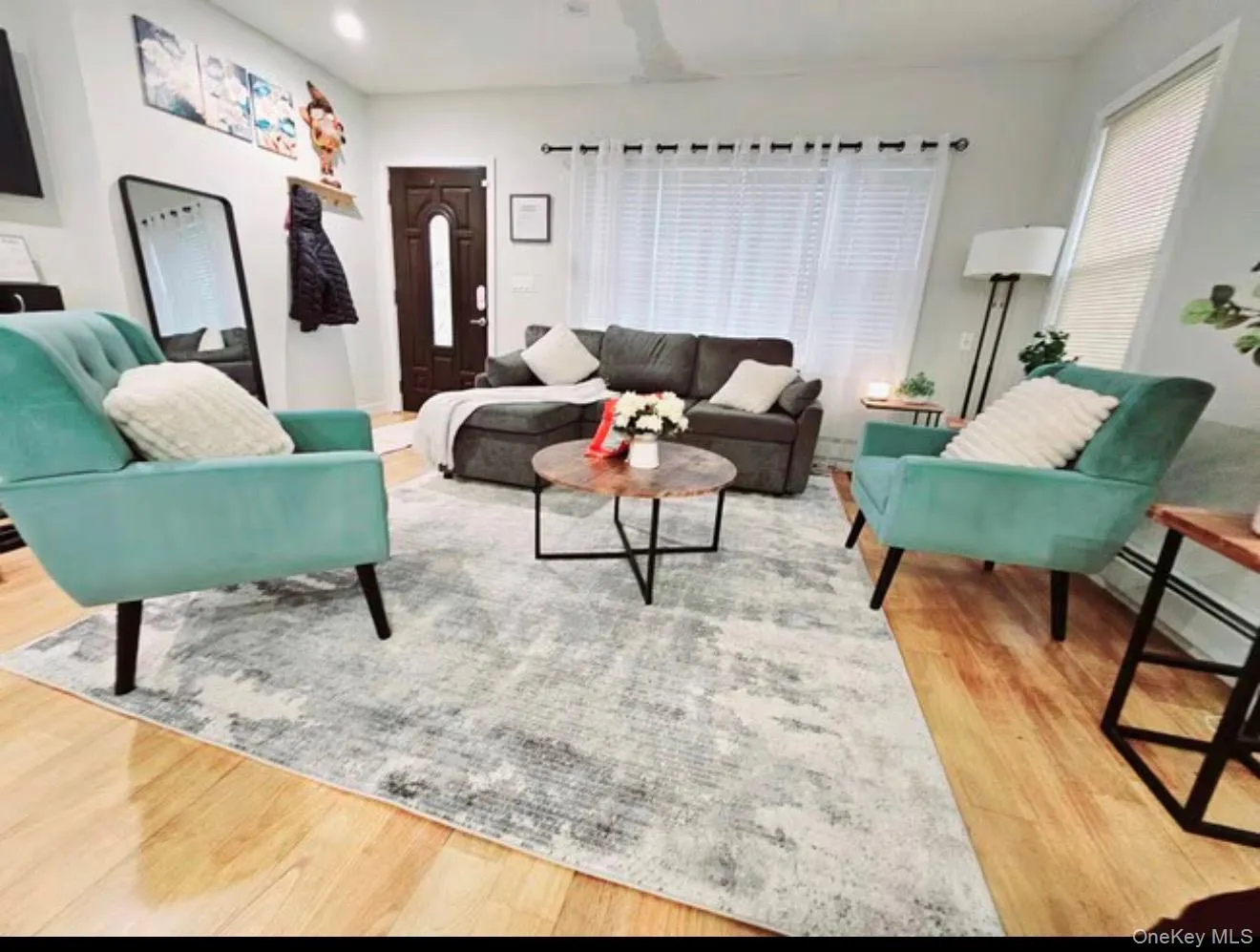 Hardwood flooring throughout the space, complemented by a ceiling fan Hardwood flooring throughout the space, complemented by a ceiling fan