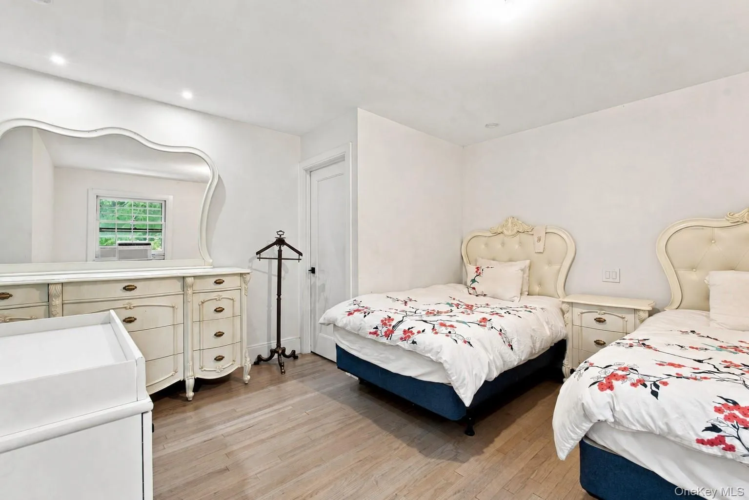 Walking Closet, Recessed lighting, light wood-finish flooring, white walls, and a window with natural light Walking Closet, Recessed lighting, light wood-finish flooring, white walls, and a window with natural light