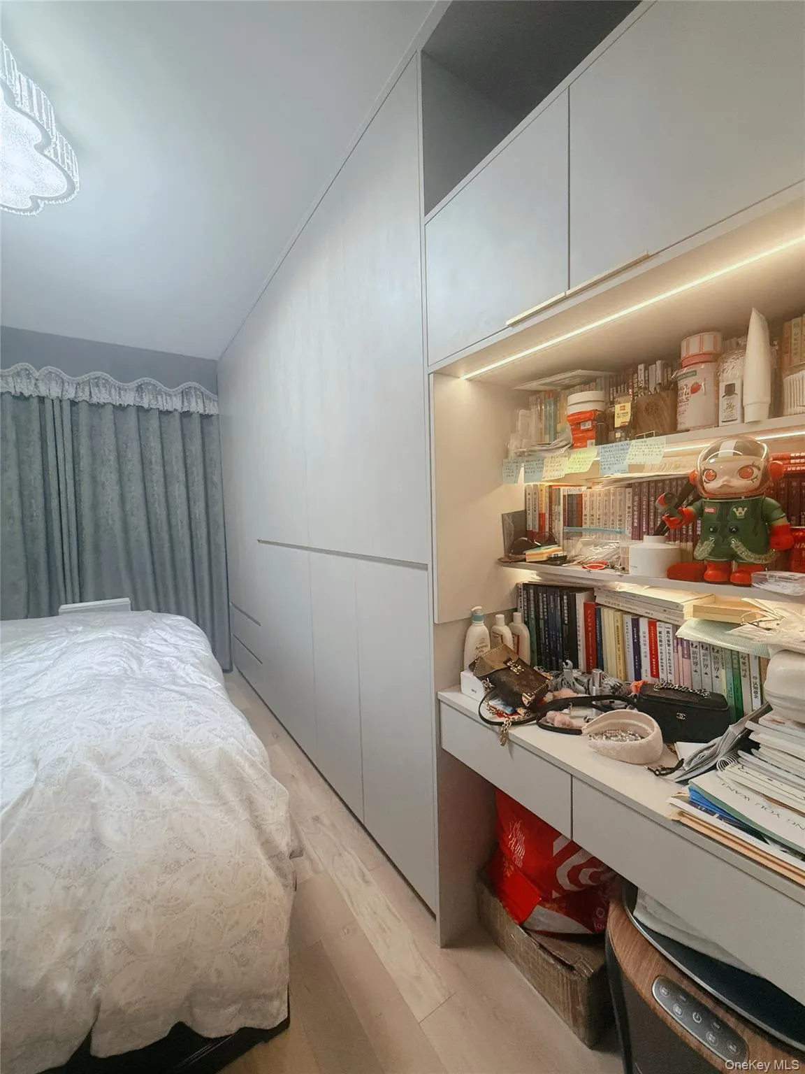 Bedroom featuring light wood-type flooring Bedroom featuring light wood-type flooring