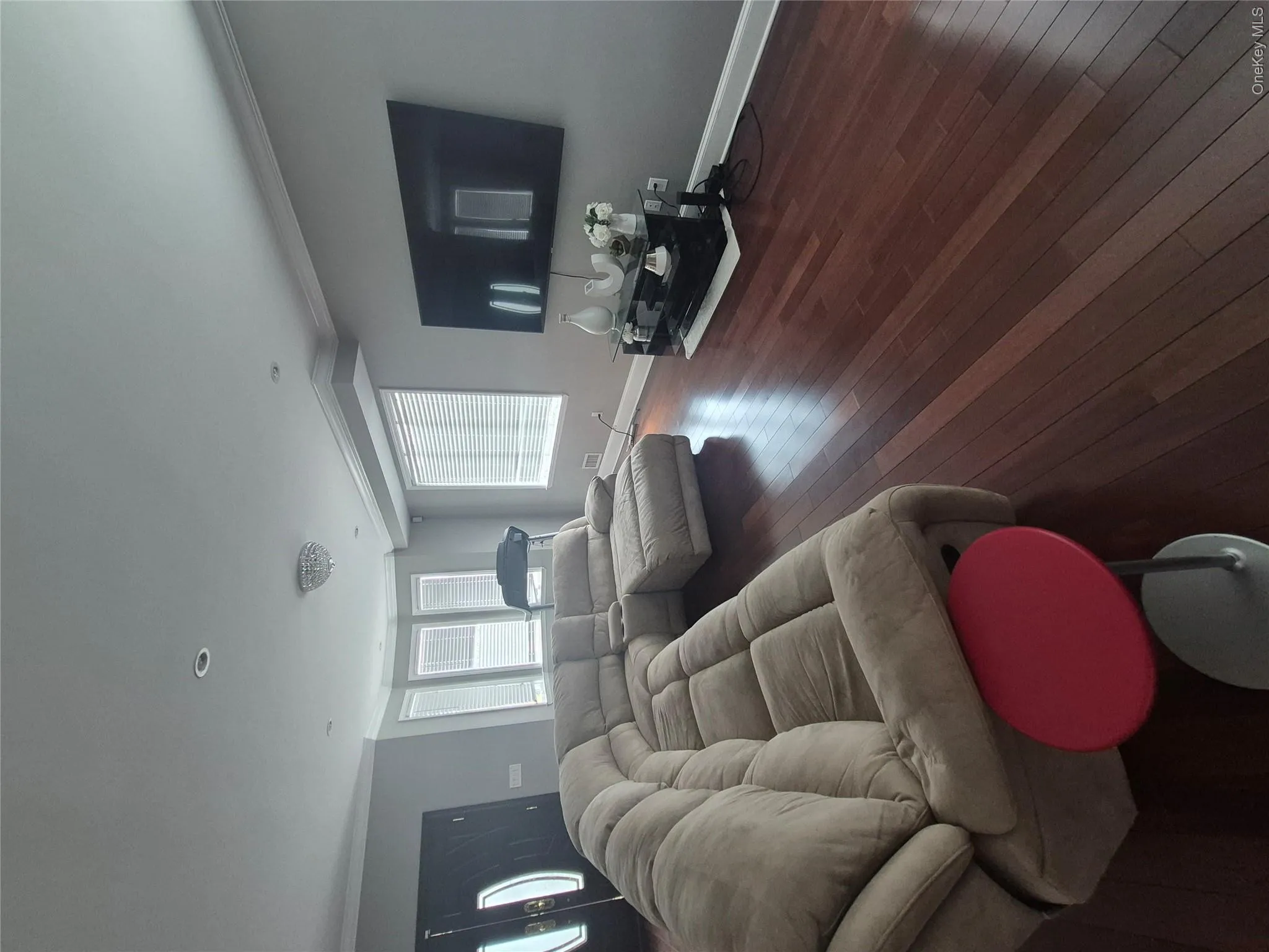 Hardwood flooring, crown molding, bay window, recessed lighting, and crystal chandelier Hardwood flooring, crown molding, bay window, recessed lighting, and crystal chandelier