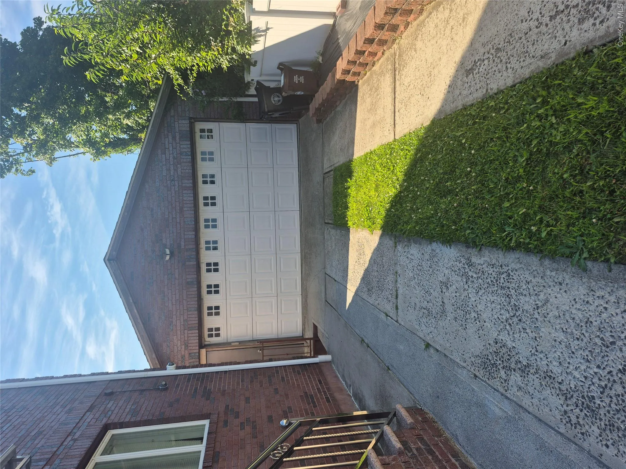 Two-car garage with extensive driveway Two-car garage with extensive driveway