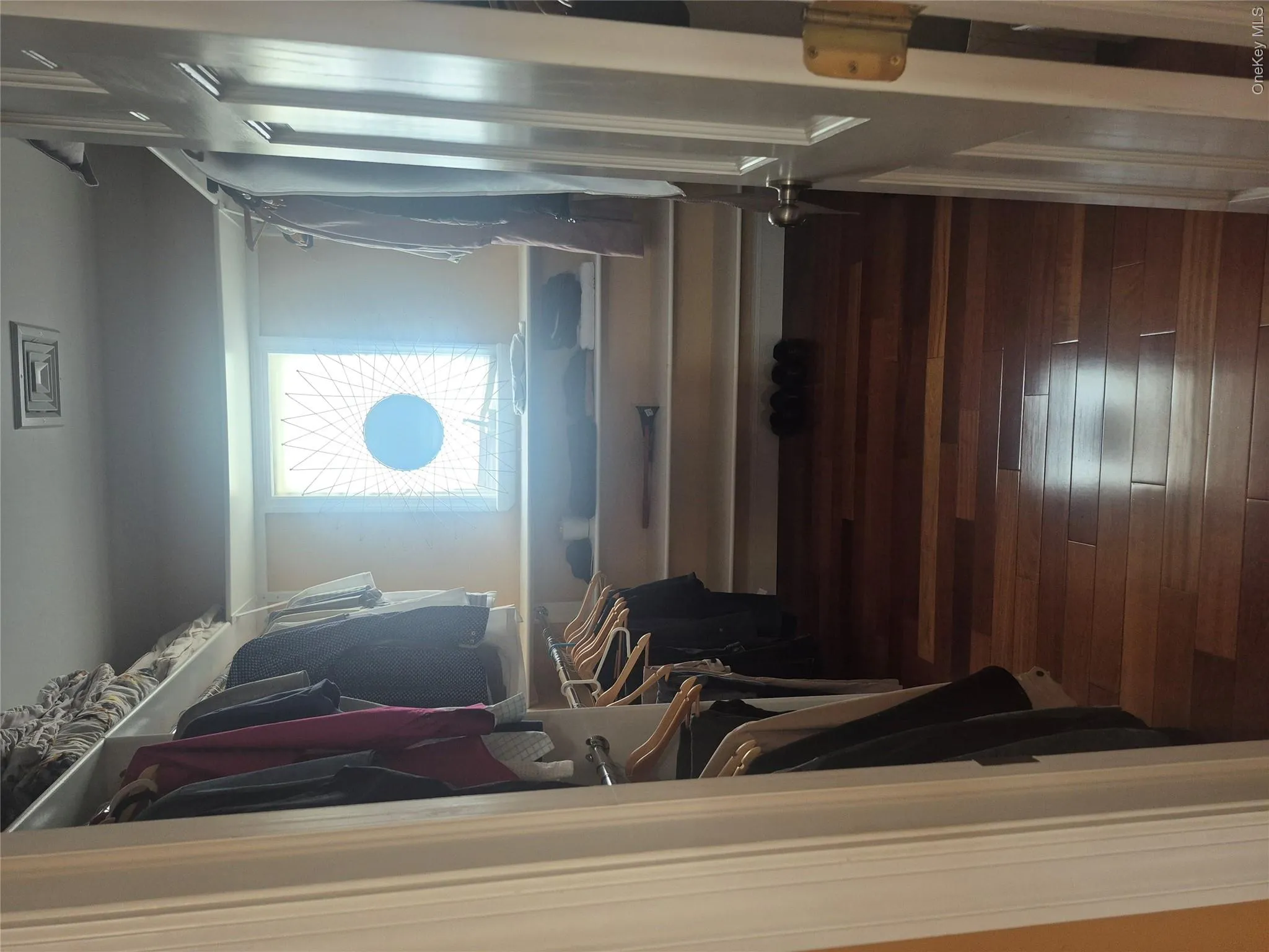 Master Bedroom large walk-in closet with window Master Bedroom large walk-in closet with window