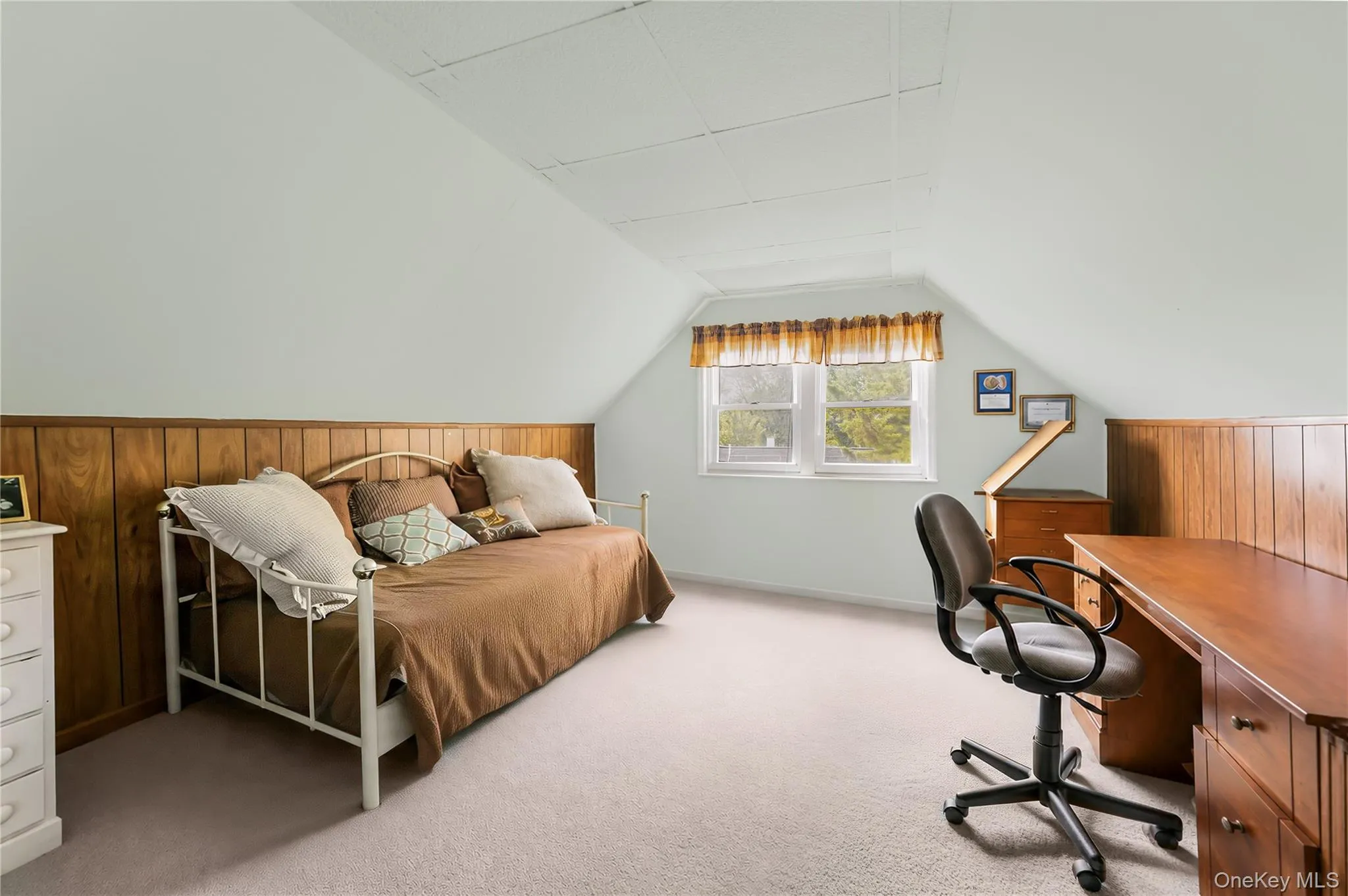 Wood-finish flooring, light-toned walls, and white trim work Wood-finish flooring, light-toned walls, and white trim work