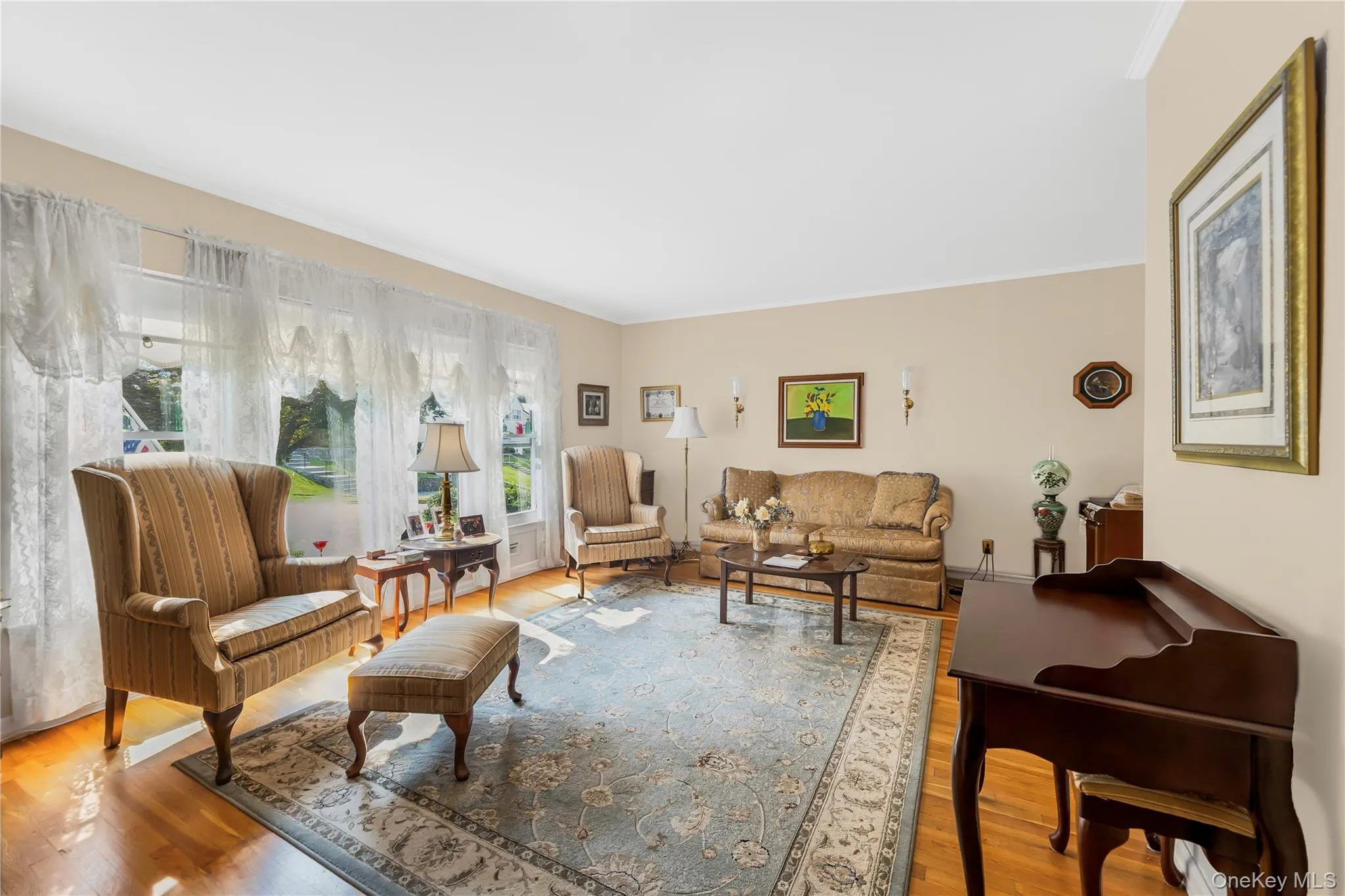 Hardwood flooring throughout, recessed lighting, and neutral wall tones Hardwood flooring throughout, recessed lighting, and neutral wall tones