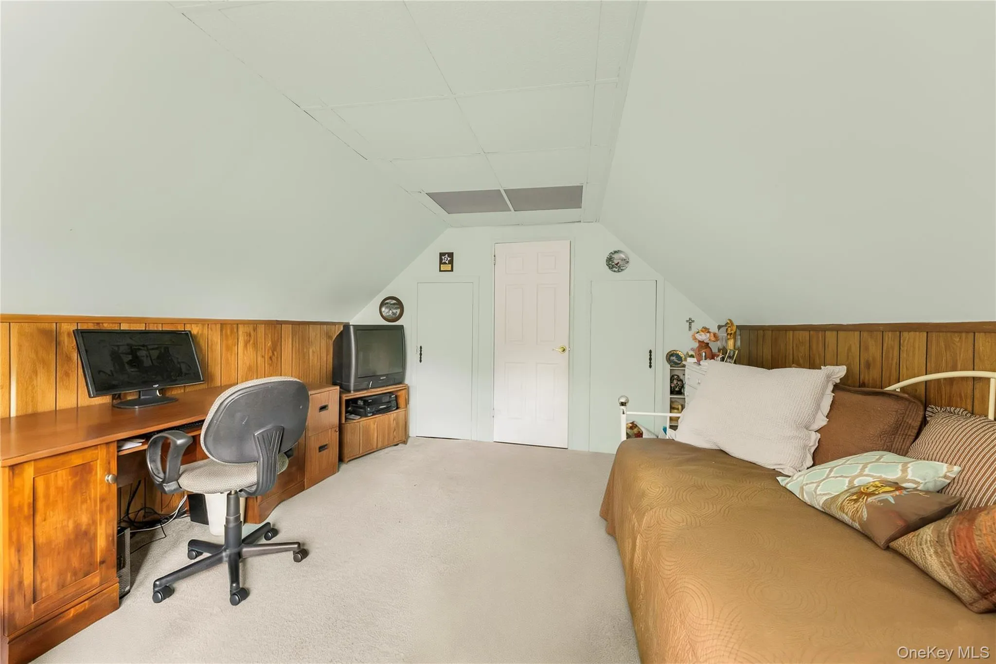 Wood-finish flooring, light-toned walls, and white trim work Wood-finish flooring, light-toned walls, and white trim work