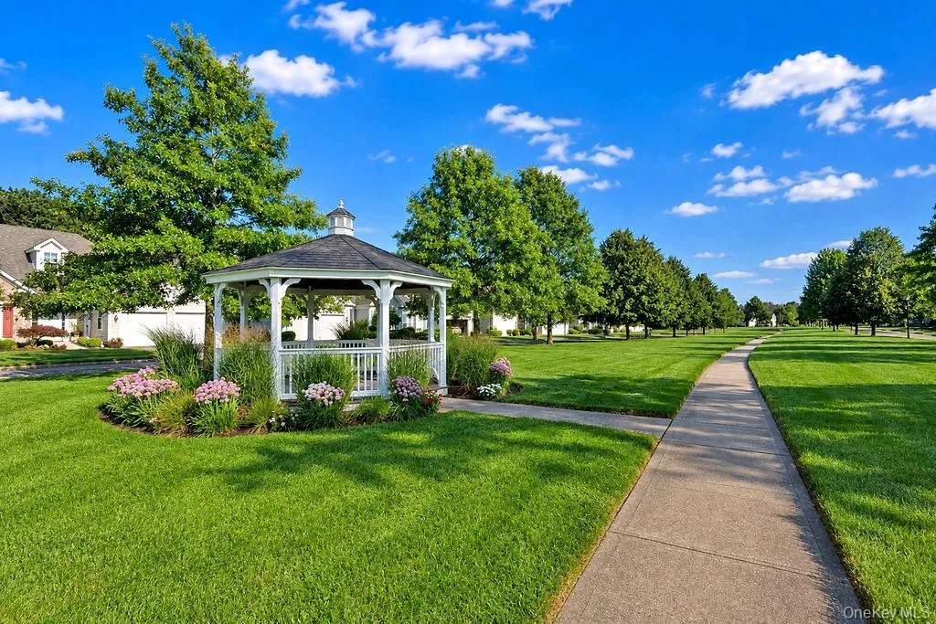 Community gazebo and landscaped walking path Community gazebo and landscaped walking path