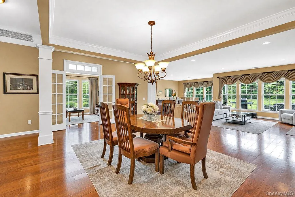 Formal Dining Room with an open view to the Living Room Formal Dining Room with an open view to the Living Room