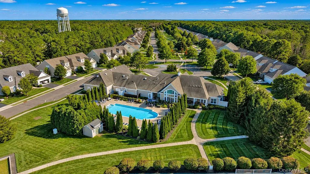Clubhouse and Outdoor pool from above. Clubhouse and Outdoor pool from above.