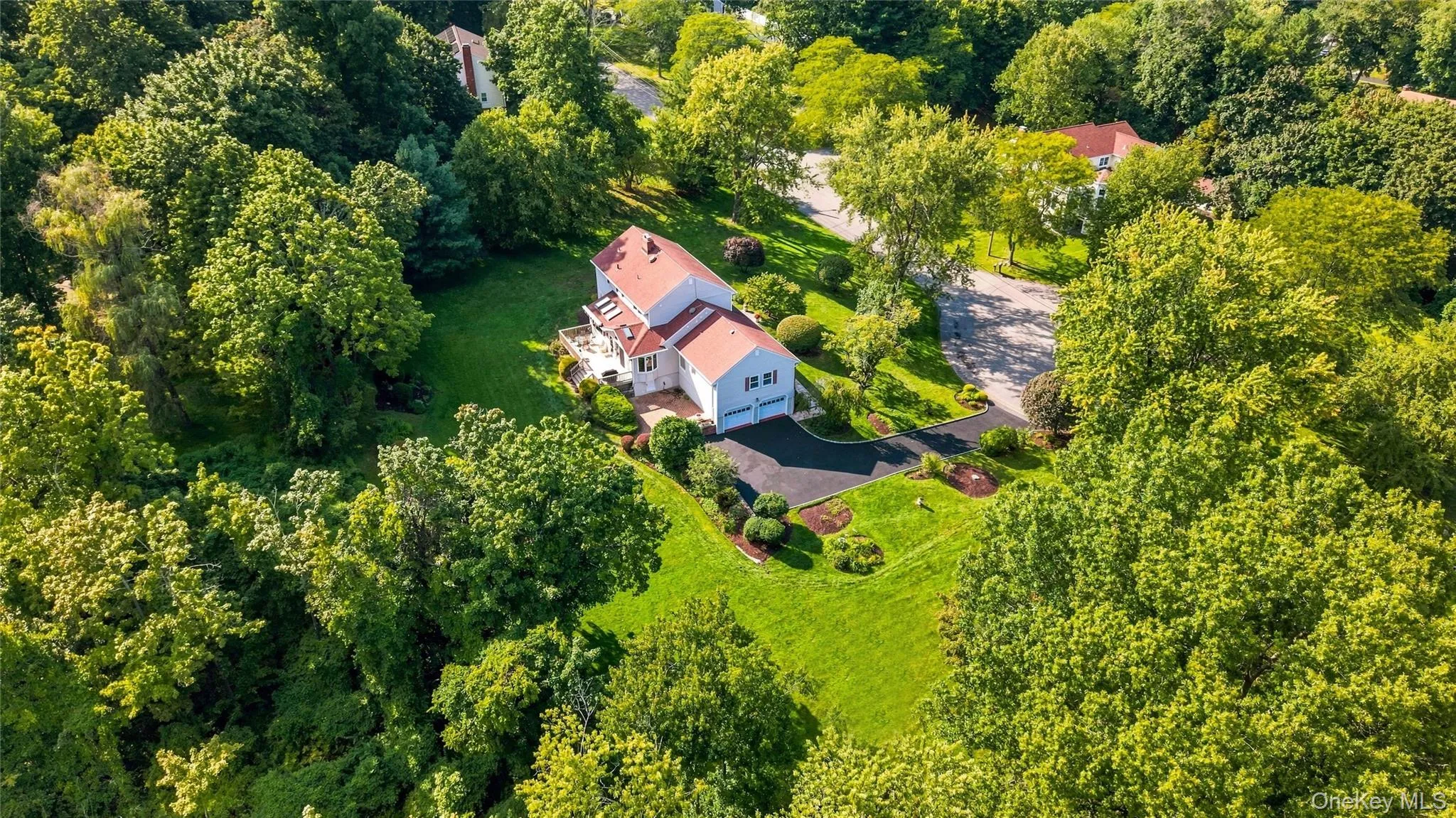 From the aerial view, you can see the large backyard, beautiful landscaping, and cul-de-sac setting From the aerial view, you can see the large backyard, beautiful landscaping, and cul-de-sac setting