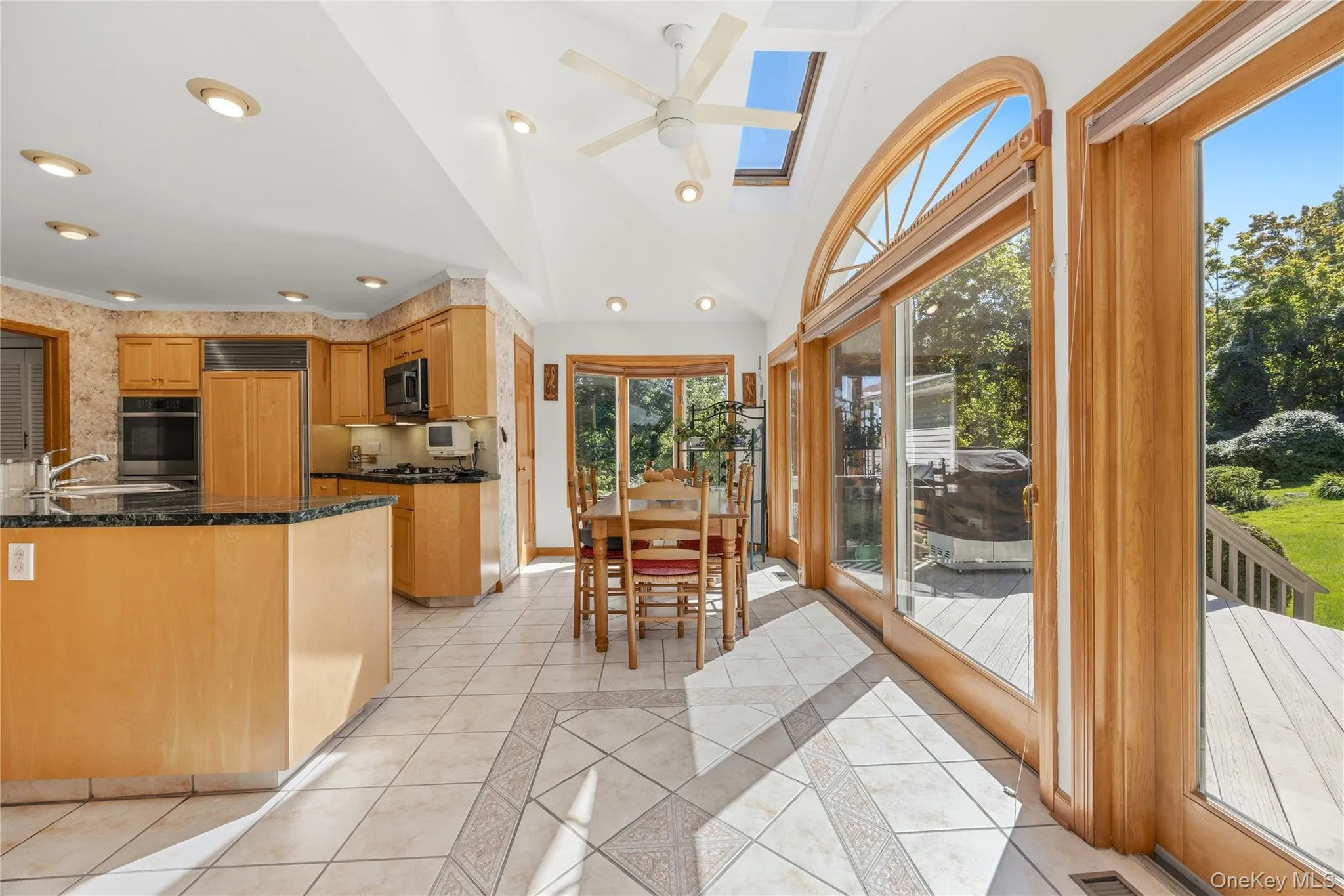 What a beautiful, sunny and private place to eat meals! Ceiling fan above the eating area with a pantry closet. What a beautiful, sunny and private place to eat meals! Ceiling fan above the eating area with a pantry closet.