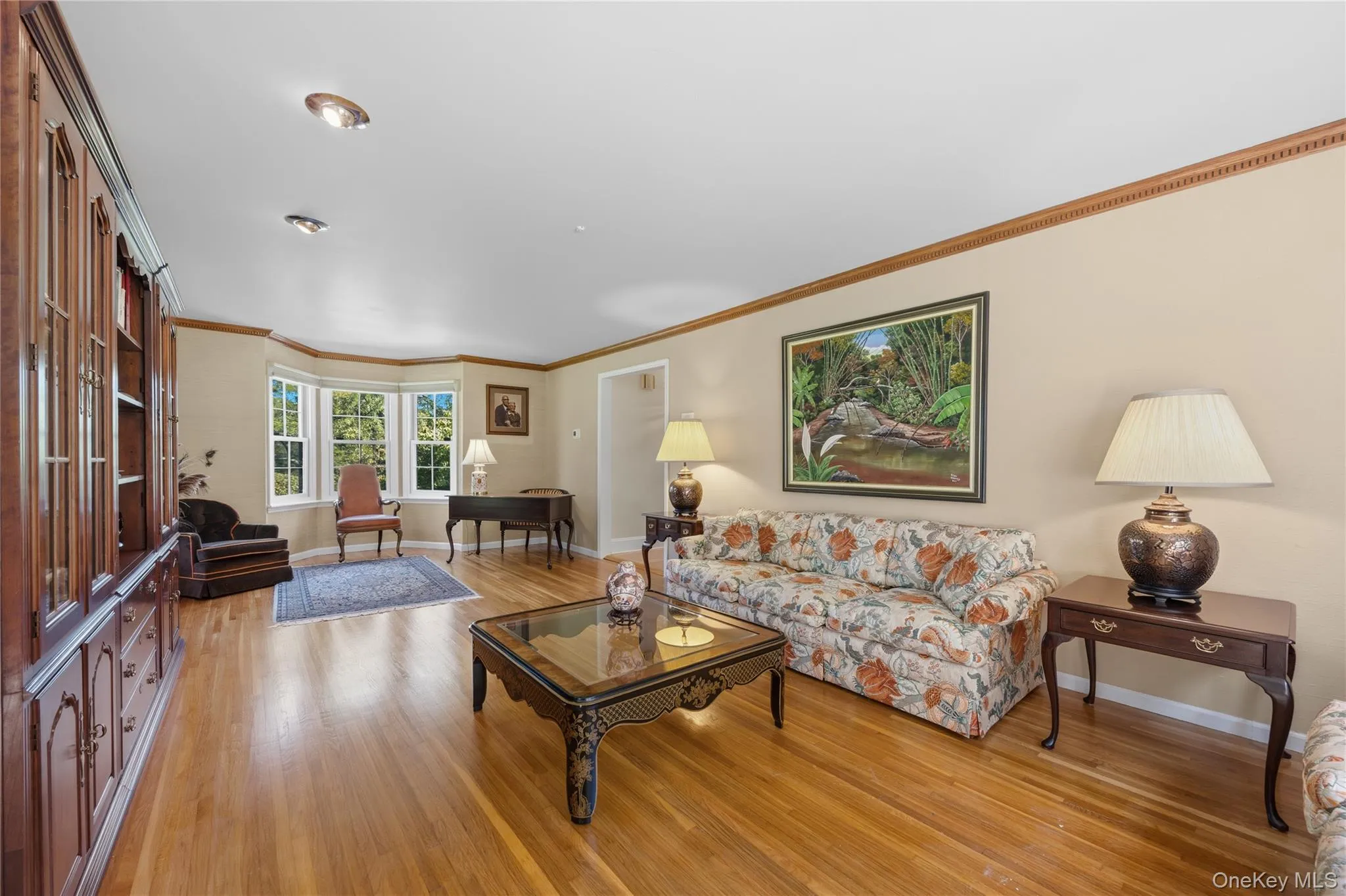 The front of the Living Room with its bow windows is a great place to hang out with friends and family! The front of the Living Room with its bow windows is a great place to hang out with friends and family!