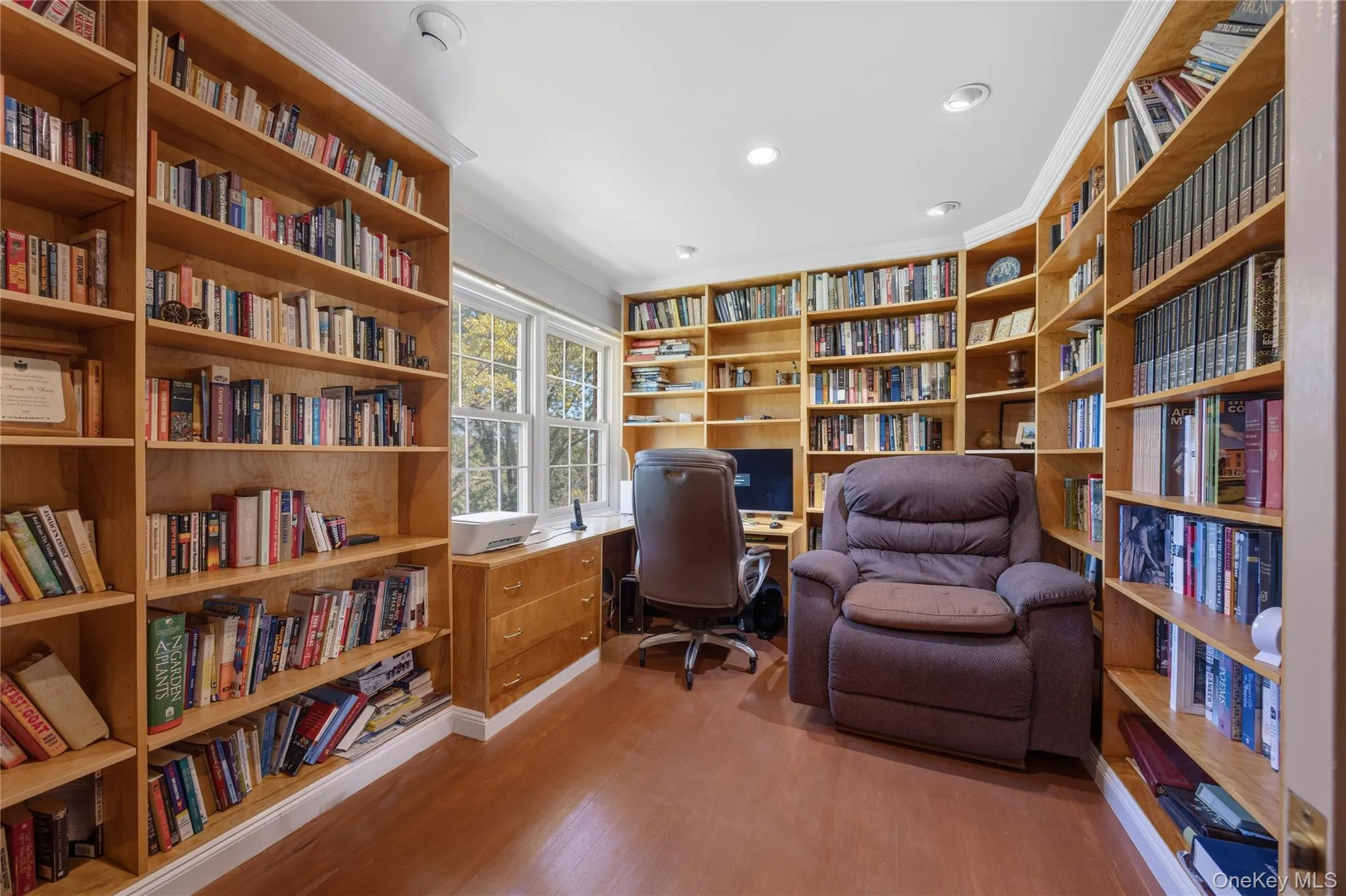 For the book lover: also on the main level is a Home Office/Library with built-in desk, drawers and bookshelves. For the book lover: also on the main level is a Home Office/Library with built-in desk, drawers and bookshelves.