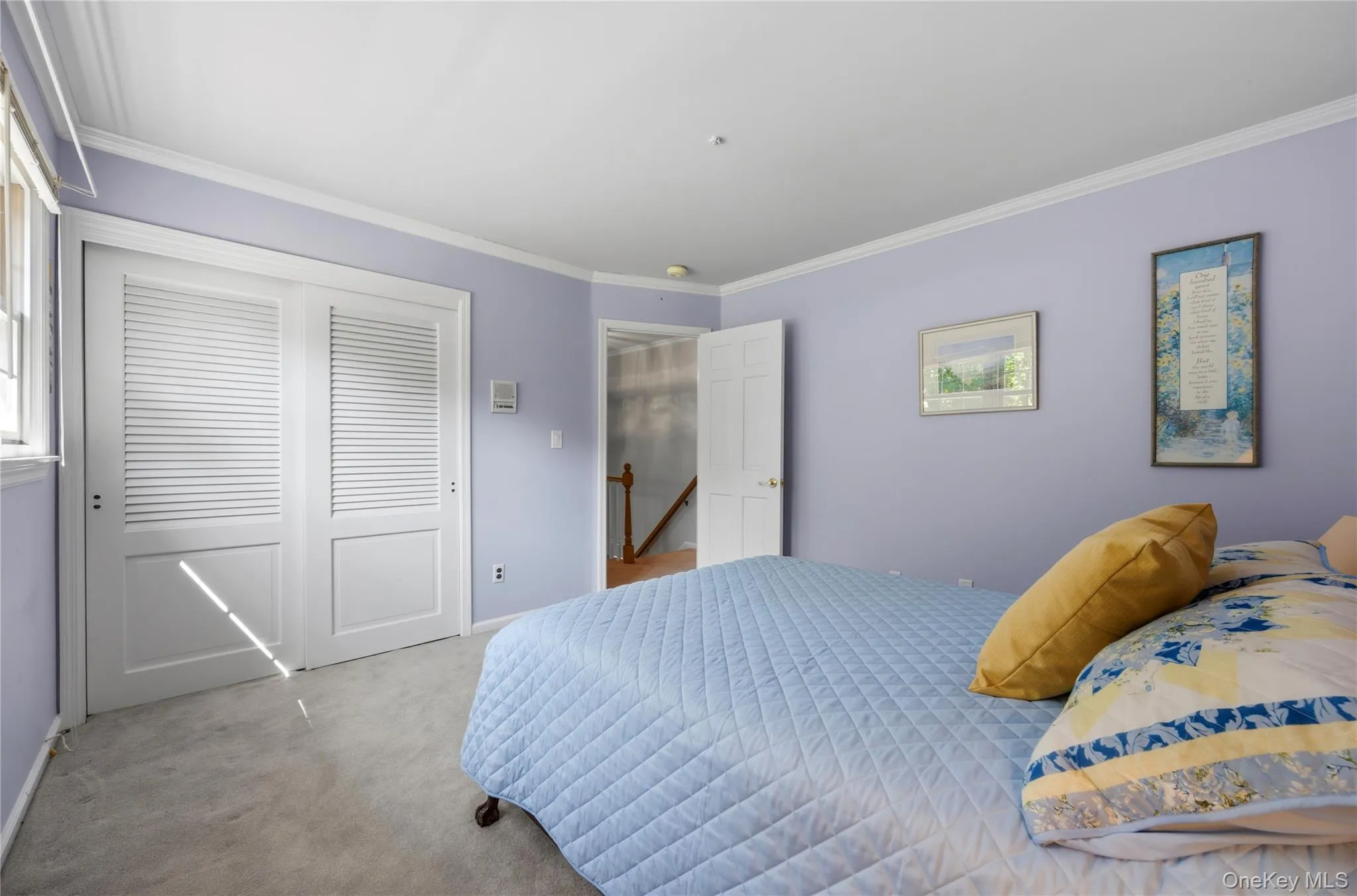 Fifth bedroom with a double width, sliding door closet Fifth bedroom with a double width, sliding door closet