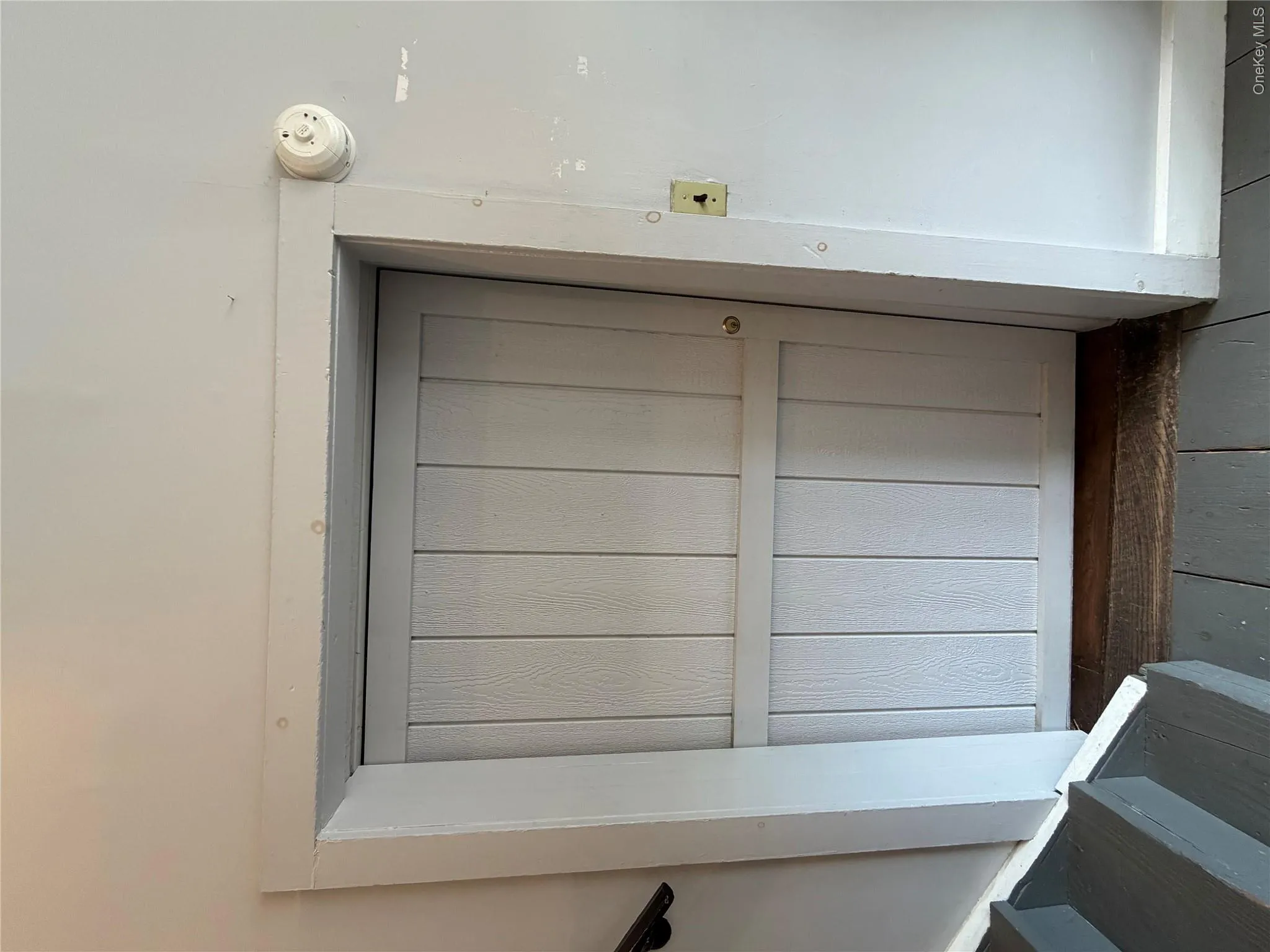 Studio entry has secure sliding barnstyle door. Studio entry has secure sliding barnstyle door.