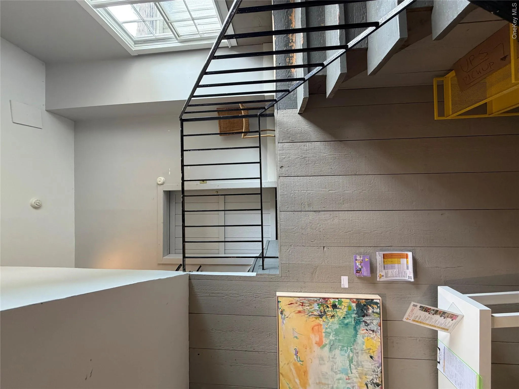 Space is accessible via short flight of stairs. Space is accessible via short flight of stairs.