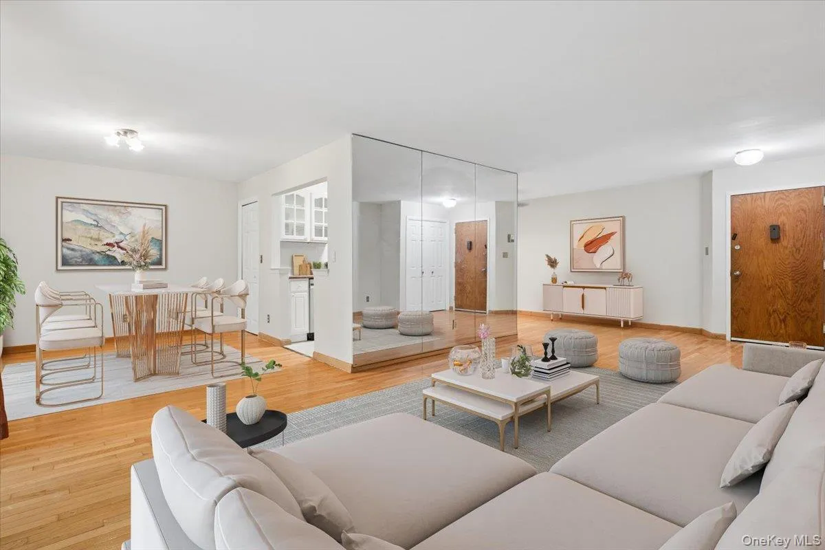 Living room view 4 -leading to dining area, virtually staged Living room view 4 -leading to dining area, virtually staged