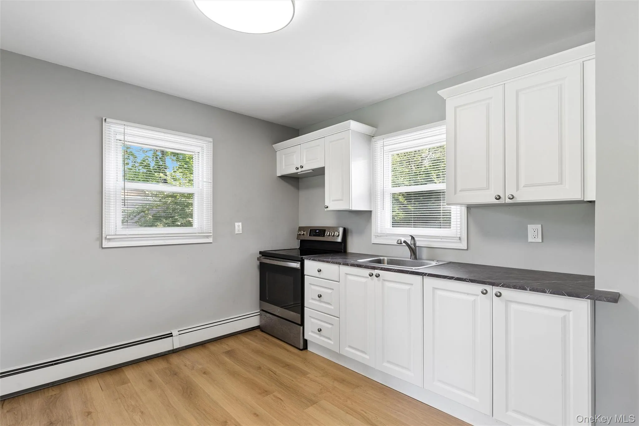 Kitchen as you enter Kitchen as you enter