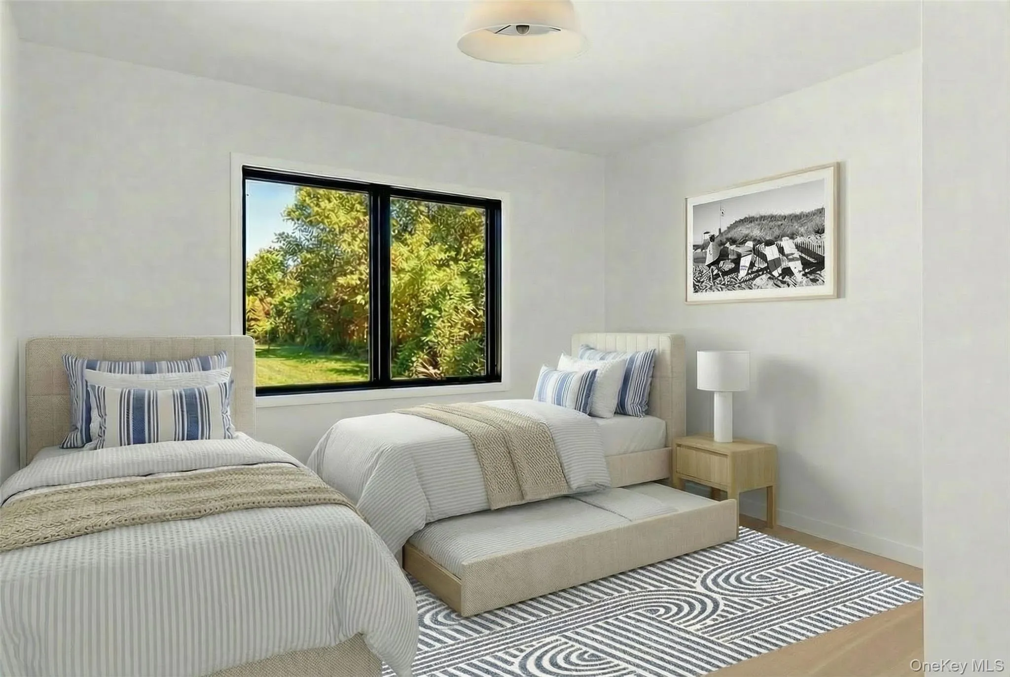 Recessed lighting fixture, light wood-finish flooring, and a large window with black trim Recessed lighting fixture, light wood-finish flooring, and a large window with black trim