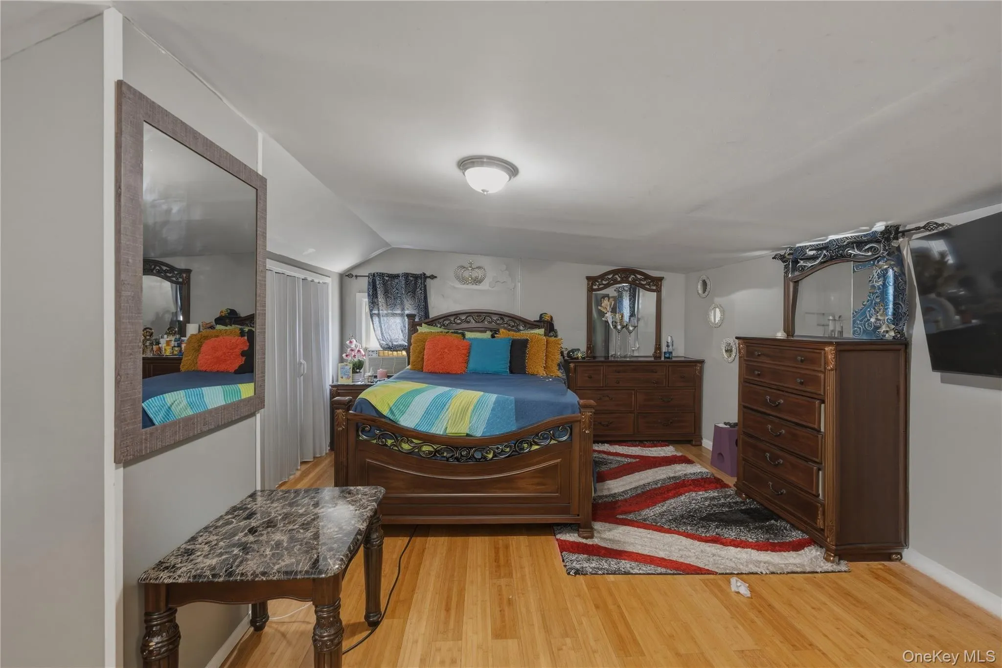 Wood-finish flooring with light gray wall paint Wood-finish flooring with light gray wall paint