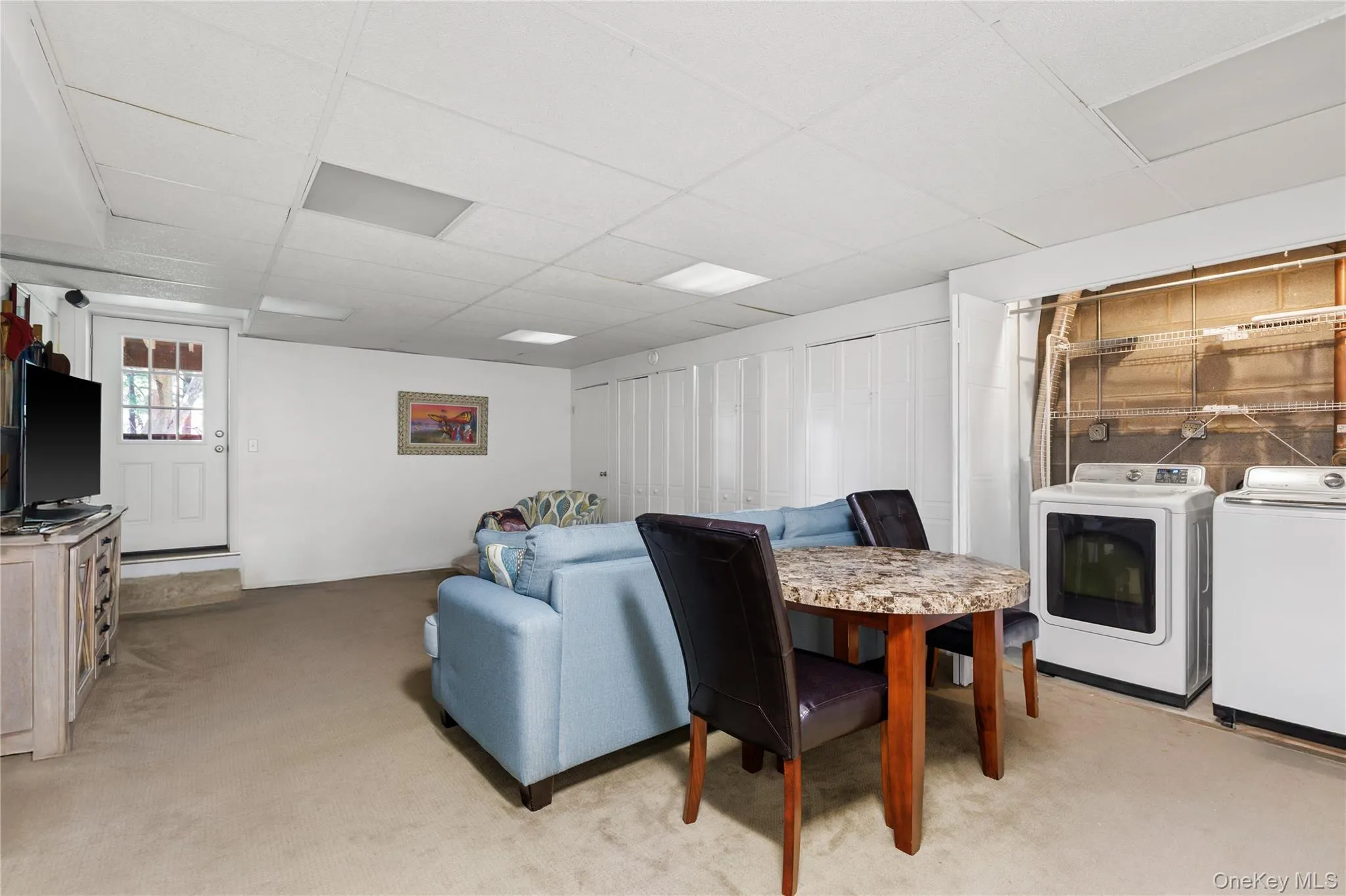 Rec room, laundry, door out Rec room, laundry, door out