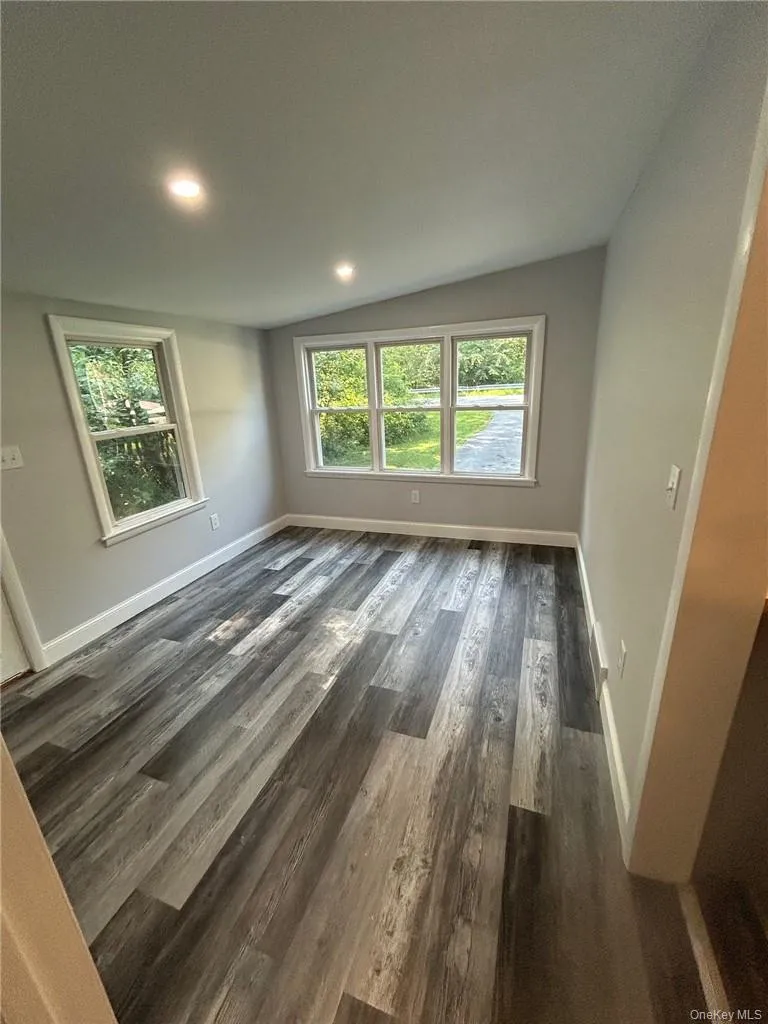 Dining or Sunroom loaded with Natural Light and vaulted ceiling Dining or Sunroom loaded with Natural Light and vaulted ceiling