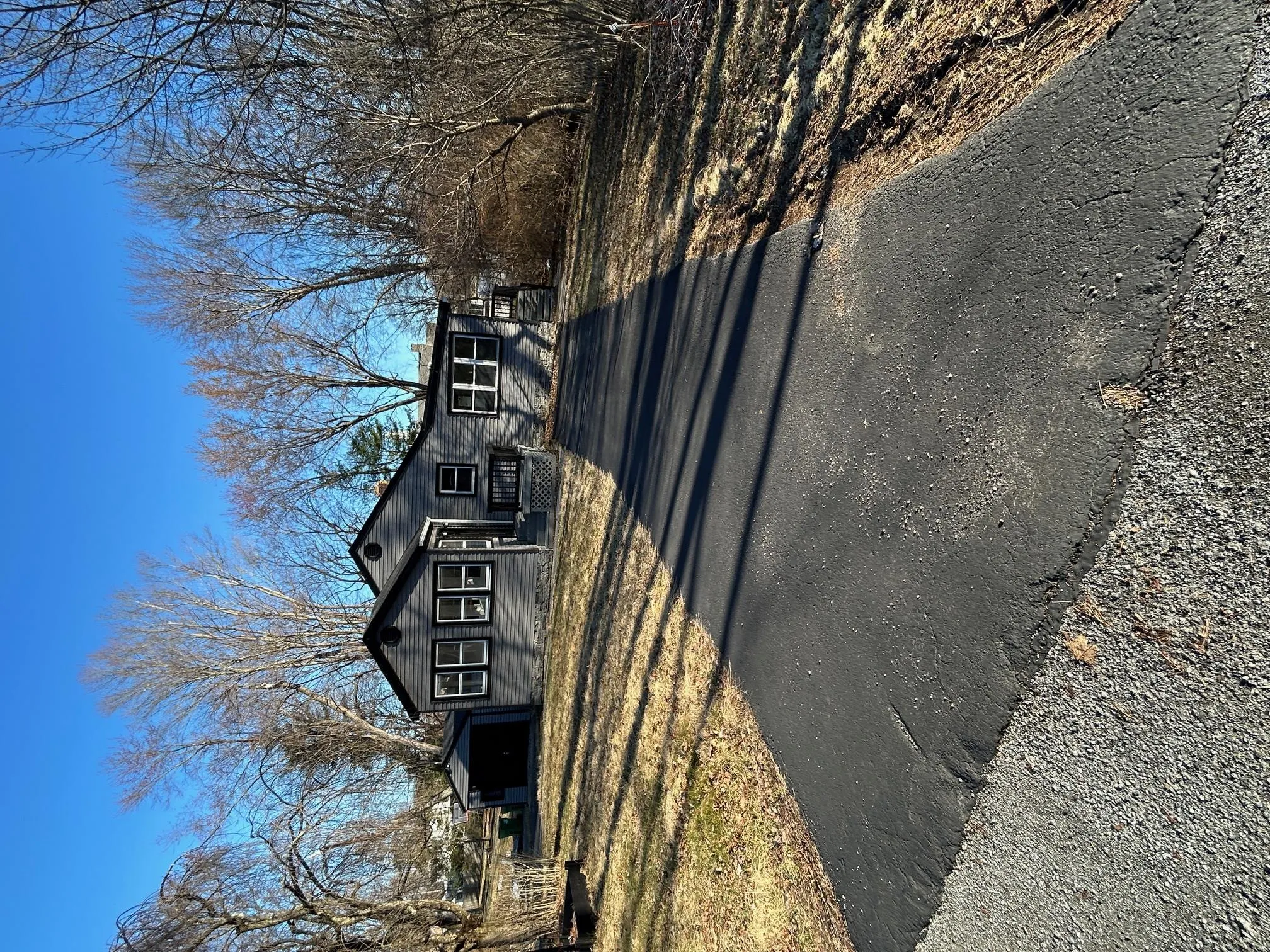 View of front of property featuring driveway View of front of property featuring driveway