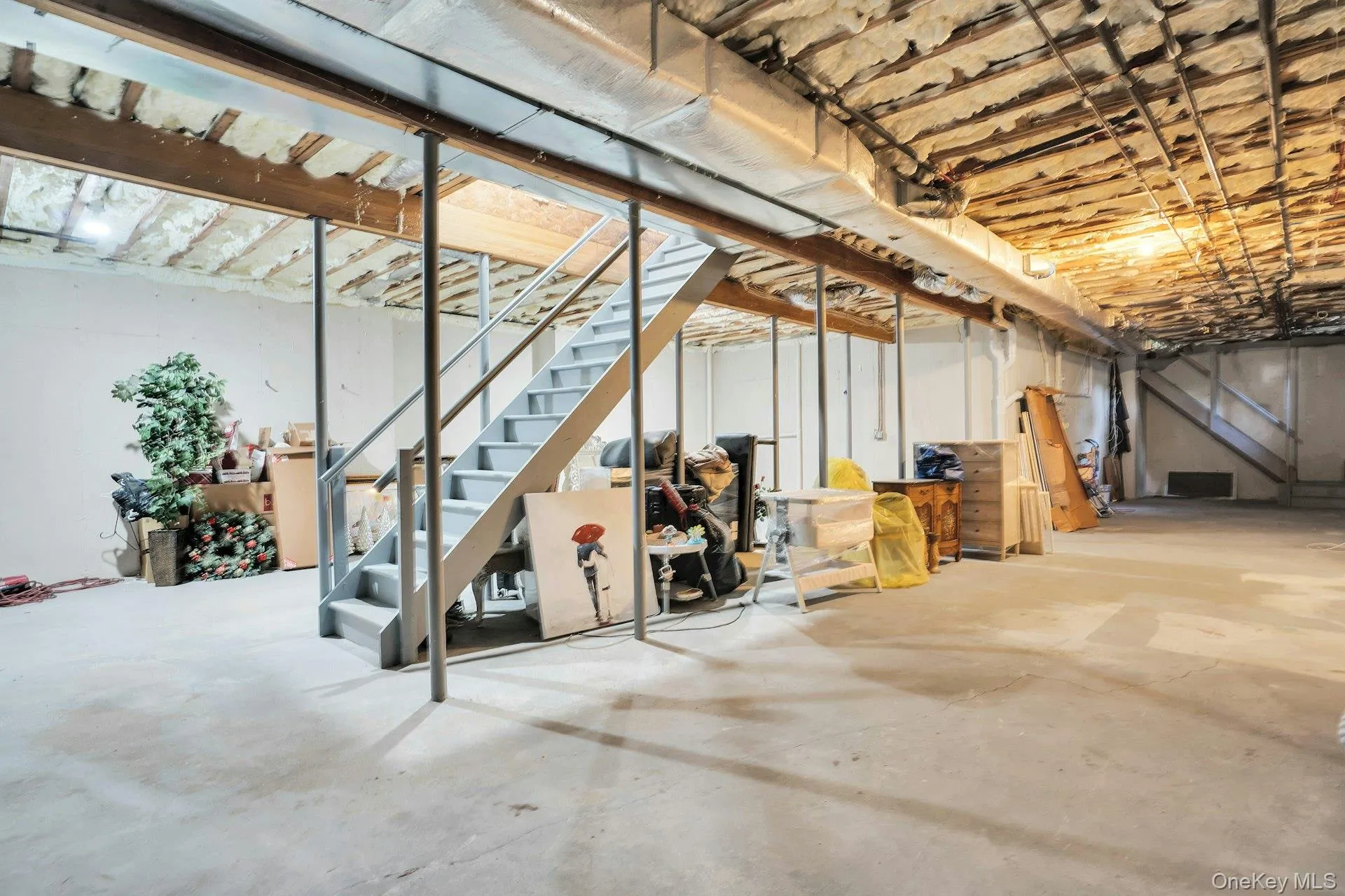 This basement has 12 foot ceilings and 2 staircases. This basement has 12 foot ceilings and 2 staircases.