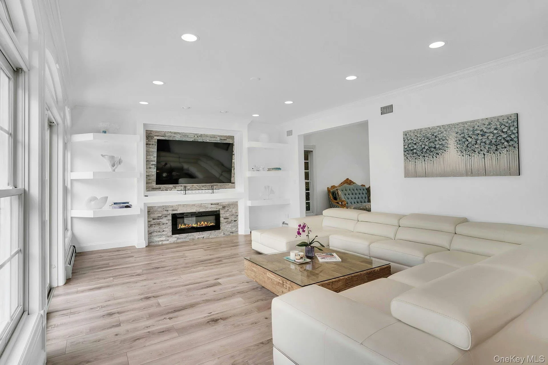 Stunning wall unit features gas fireplace. Stunning wall unit features gas fireplace.