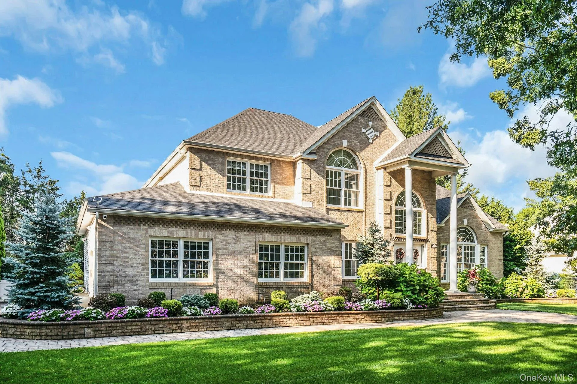 Brick Post Modern Professional Landscaped and Maintained. Brick Post Modern Professional Landscaped and Maintained.
