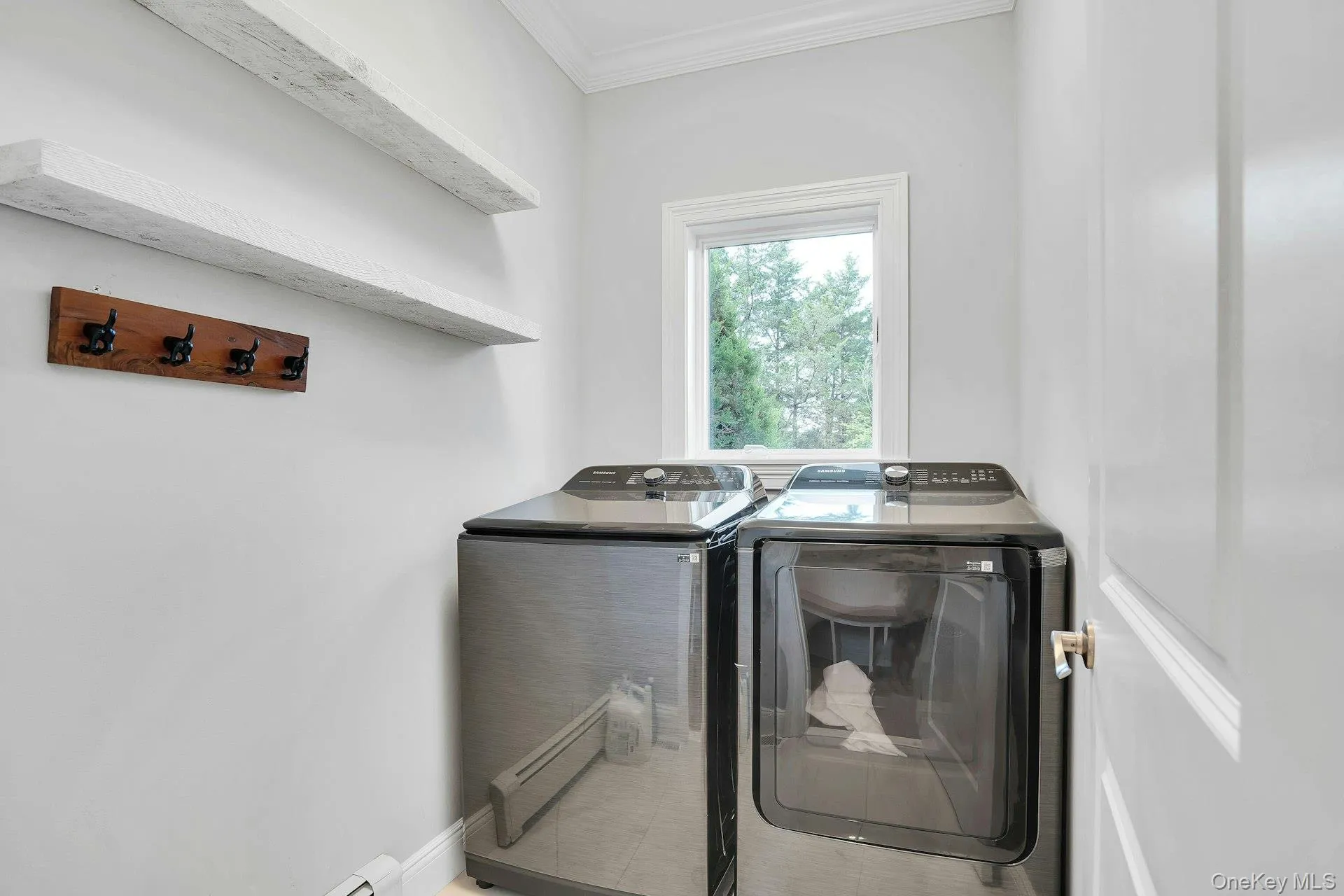 Separate laundry room has a door you can close! Separate laundry room has a door you can close!