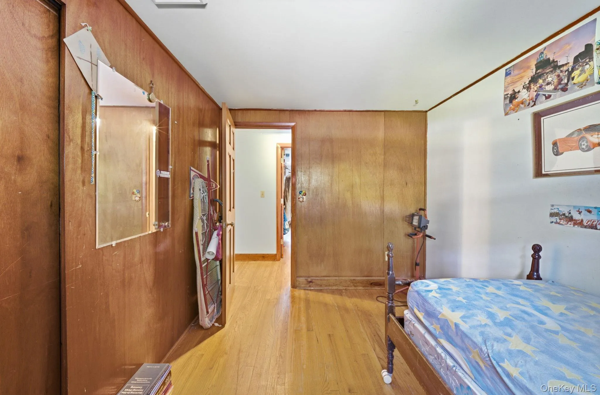 3rd bedroom with wood floors and panelling. Opposite view 3rd bedroom with wood floors and panelling. Opposite view